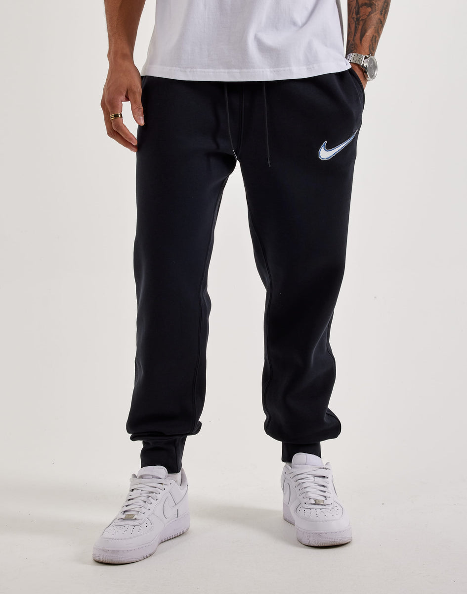 nike swoosh black joggers