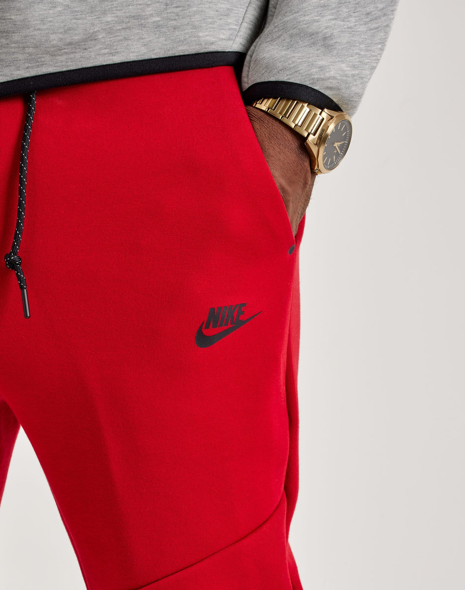 nike tech joggers red