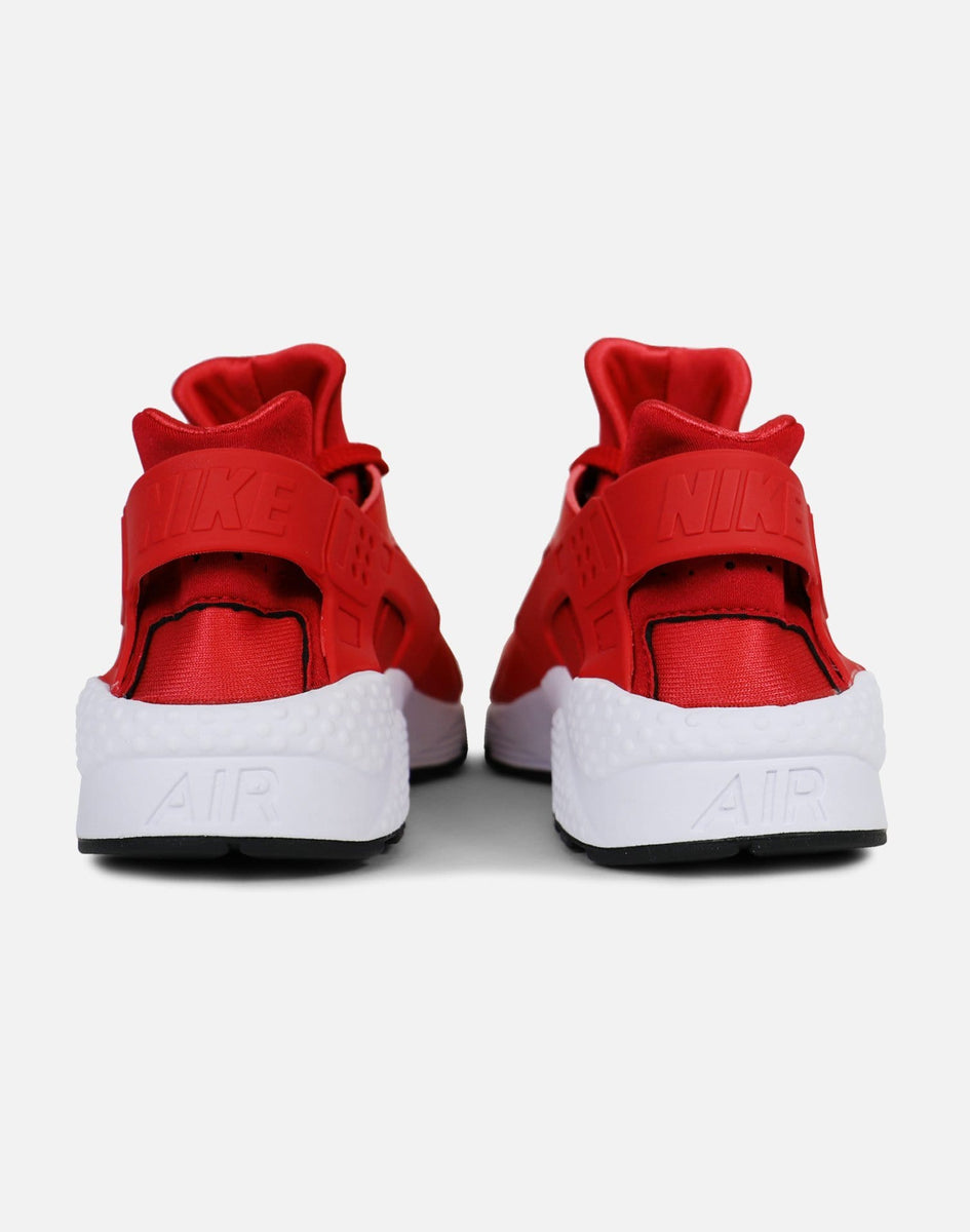red huaraches with white bottoms