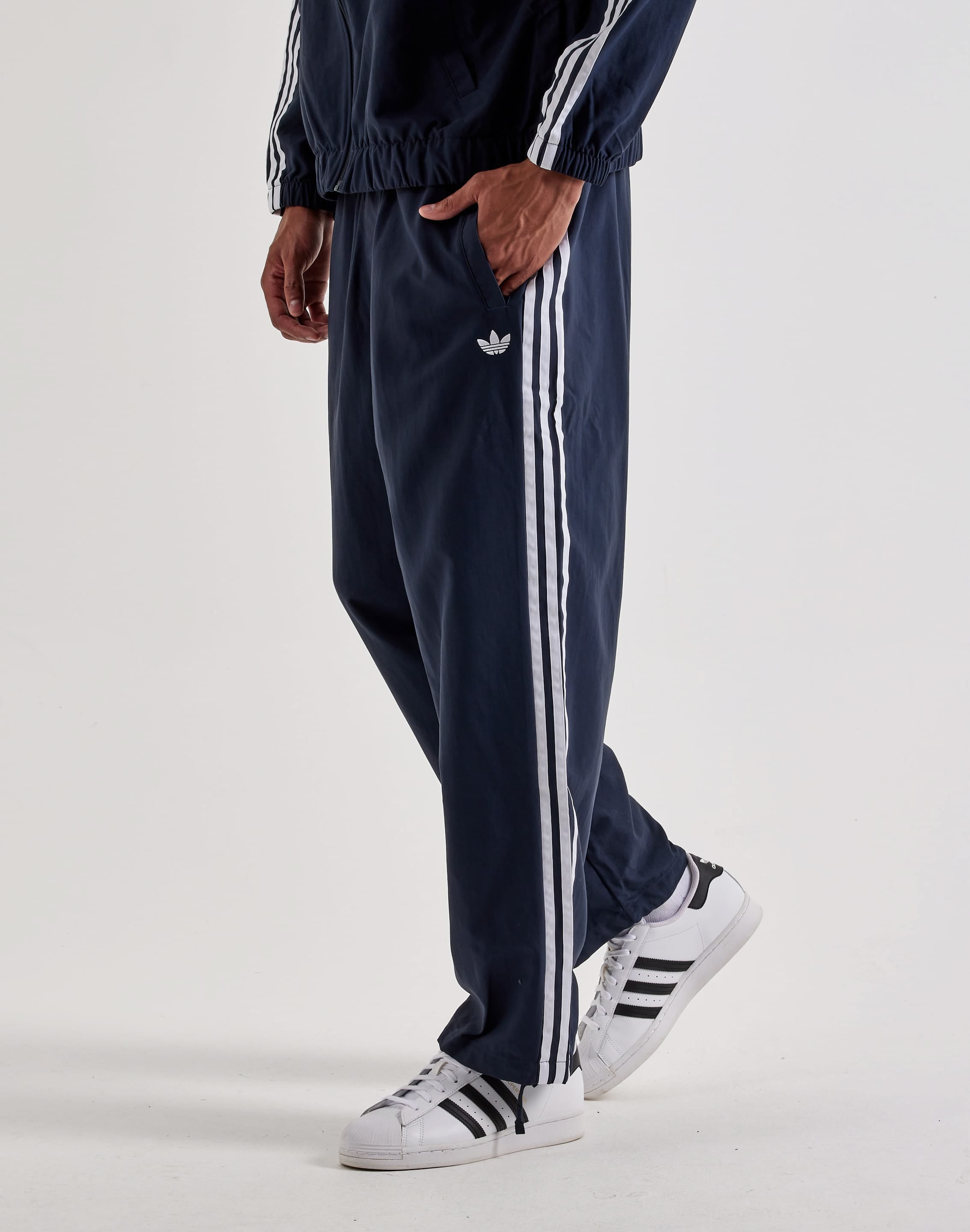 Photo of Adidas Superfire Track Pants