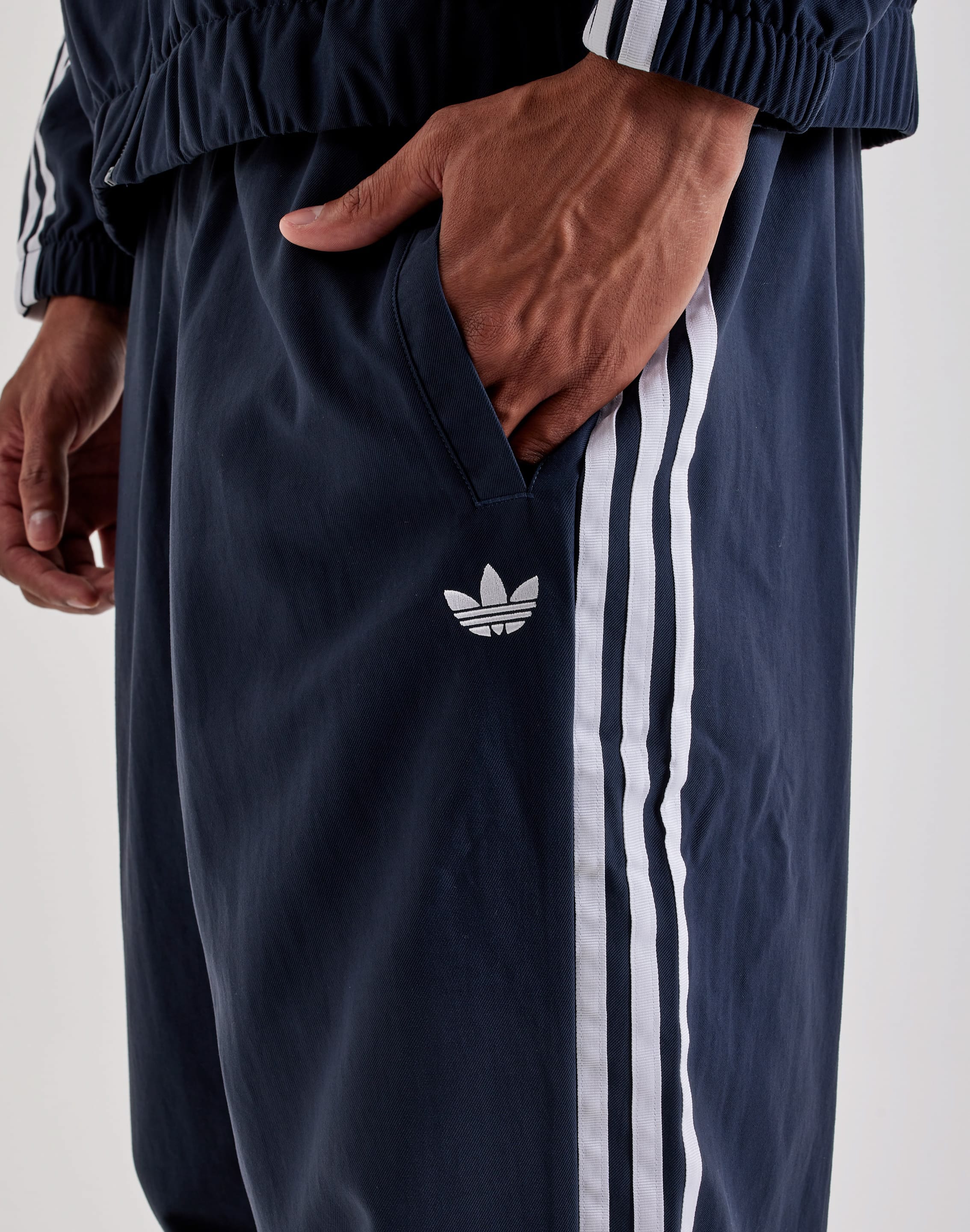 Photo of Adidas Superfire Track Pants