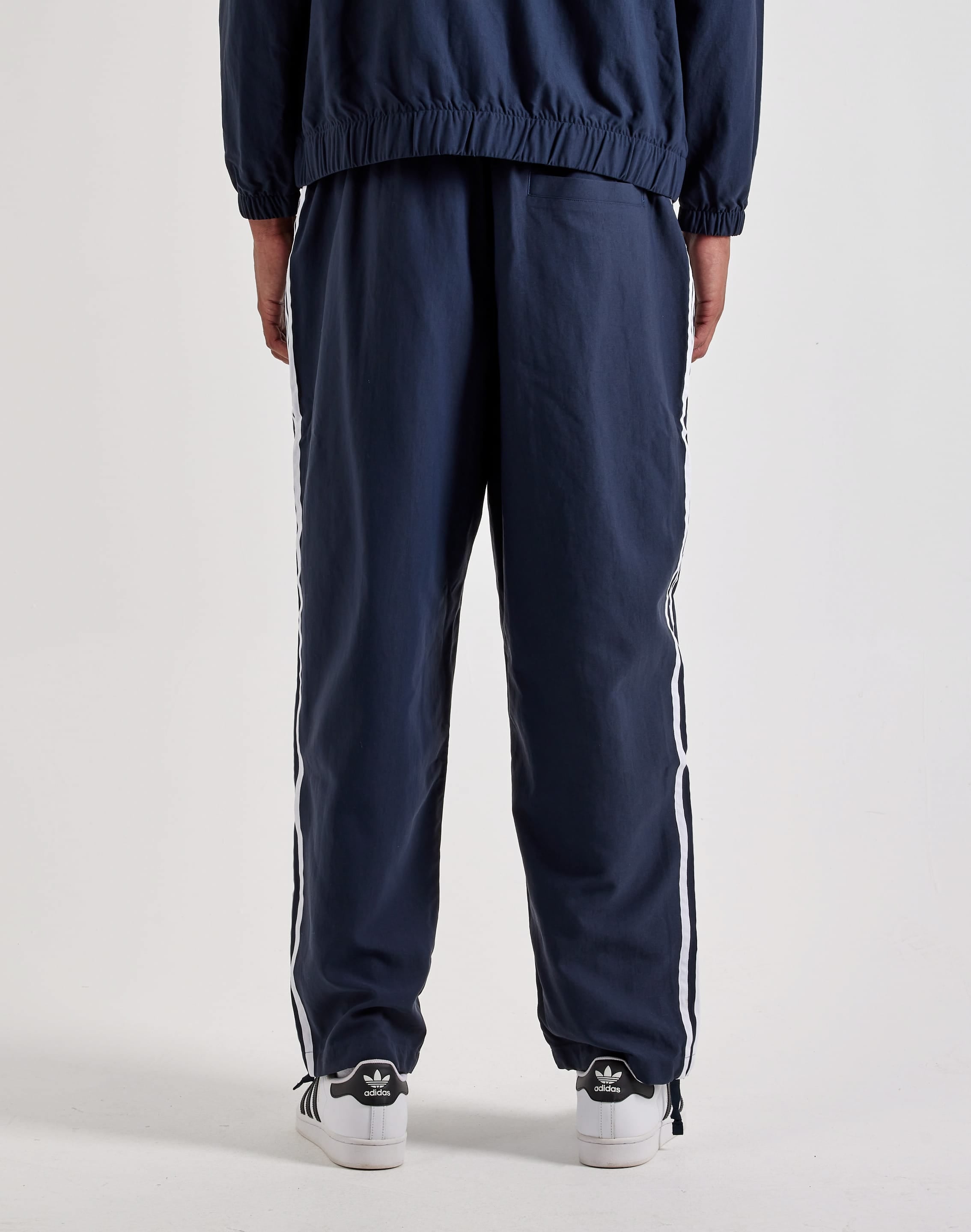 Photo of Adidas Superfire Track Pants