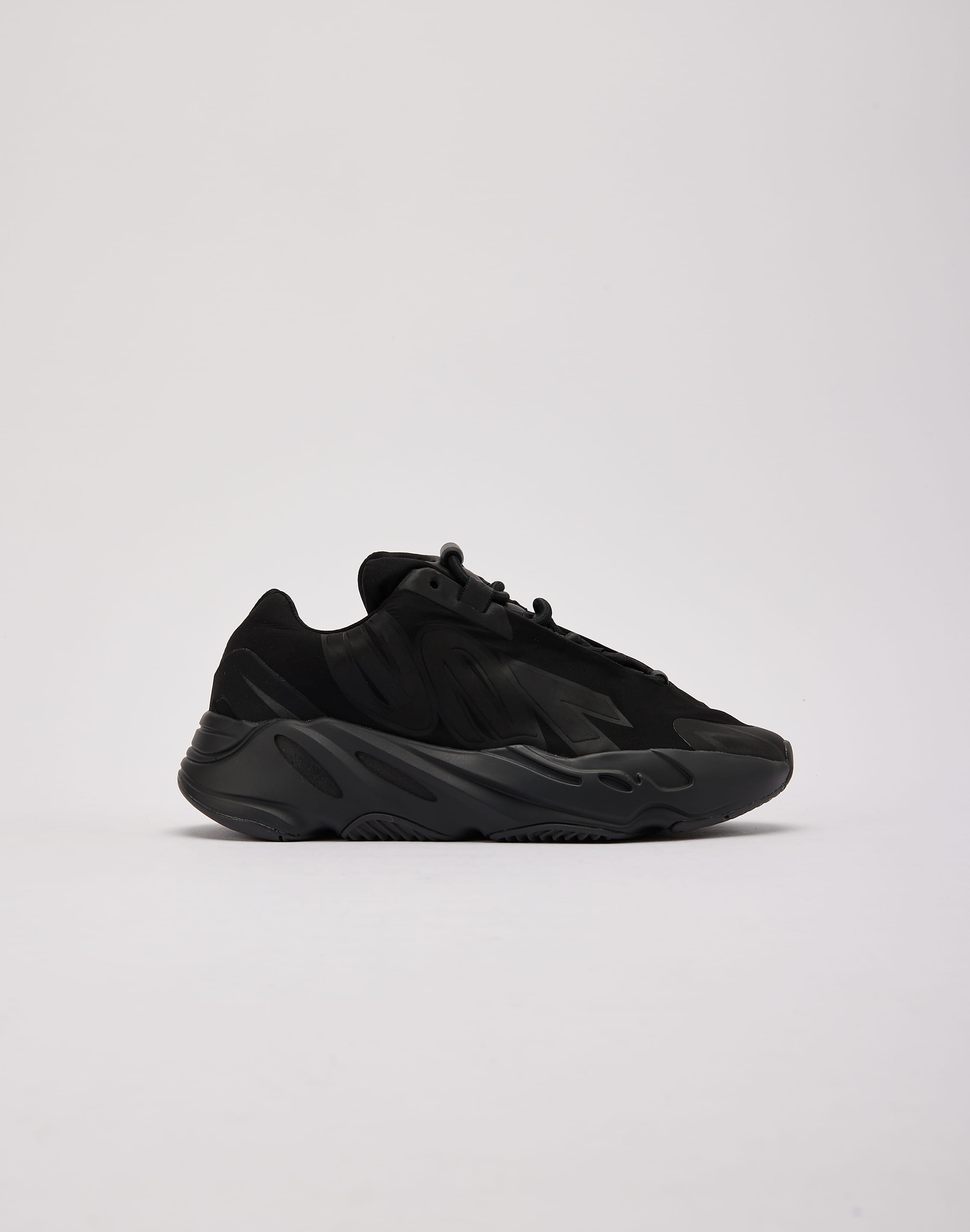 Adidas Yeezy Boost 700 MNVN 'Triple Black' Grade-School DTLR Adidas Yeezy Boost 700 MNVN 'Triple Black' Grade-School DTLR