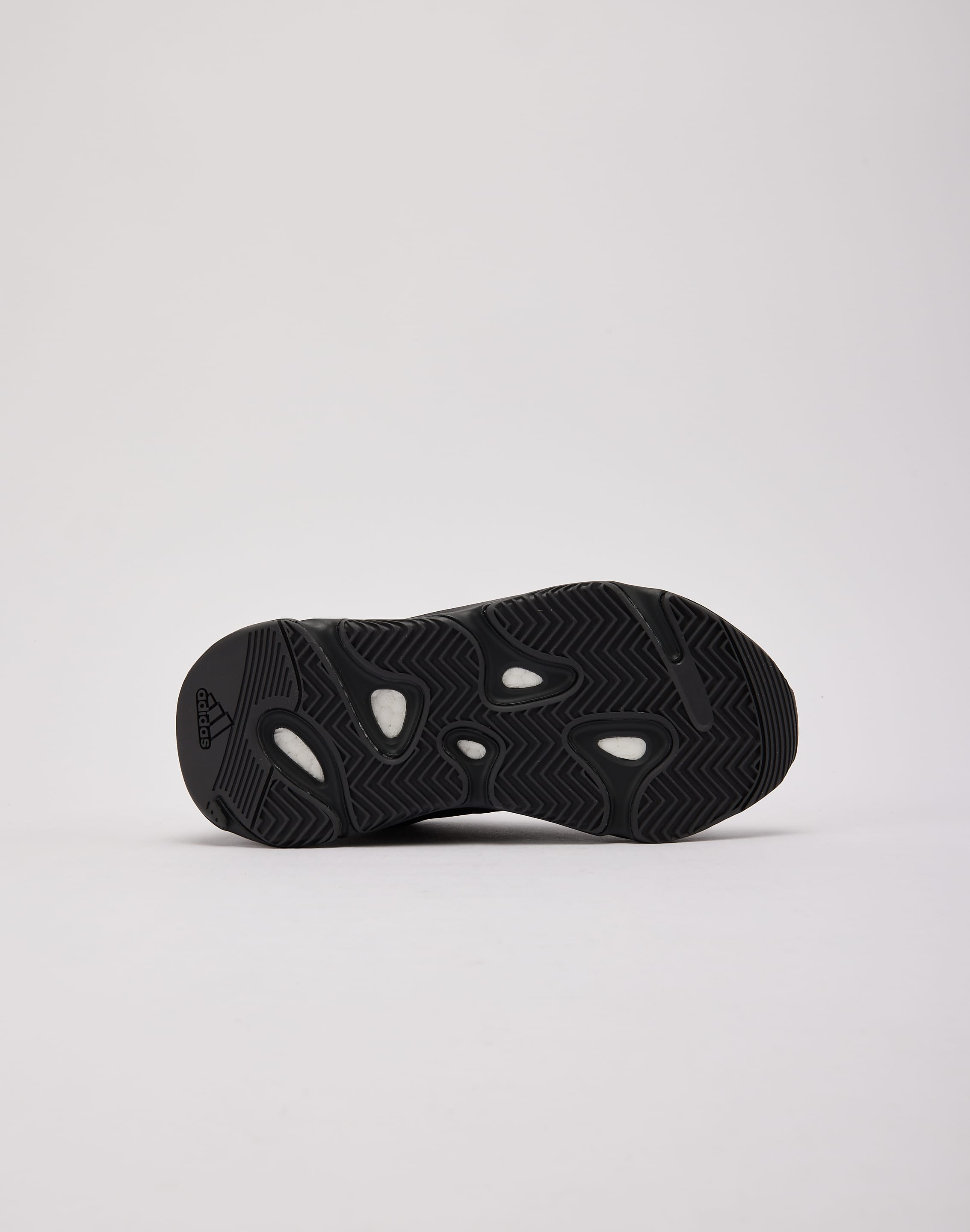 Adidas Yeezy Boost 700 MNVN 'Triple Black' Grade-School DTLR Adidas Yeezy Boost 700 MNVN 'Triple Black' Grade-School DTLR