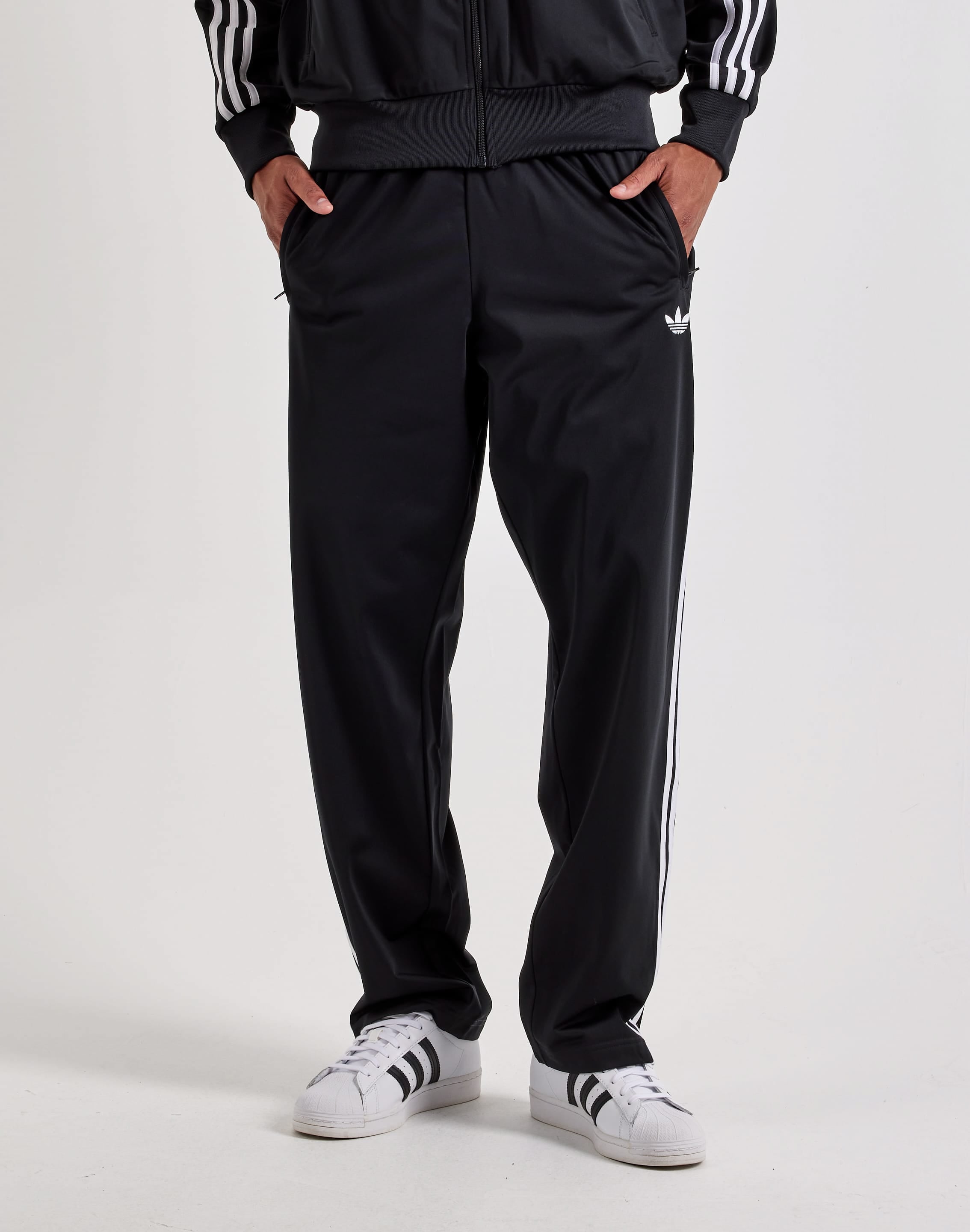 Photo of Adidas Firebird Track Pants
