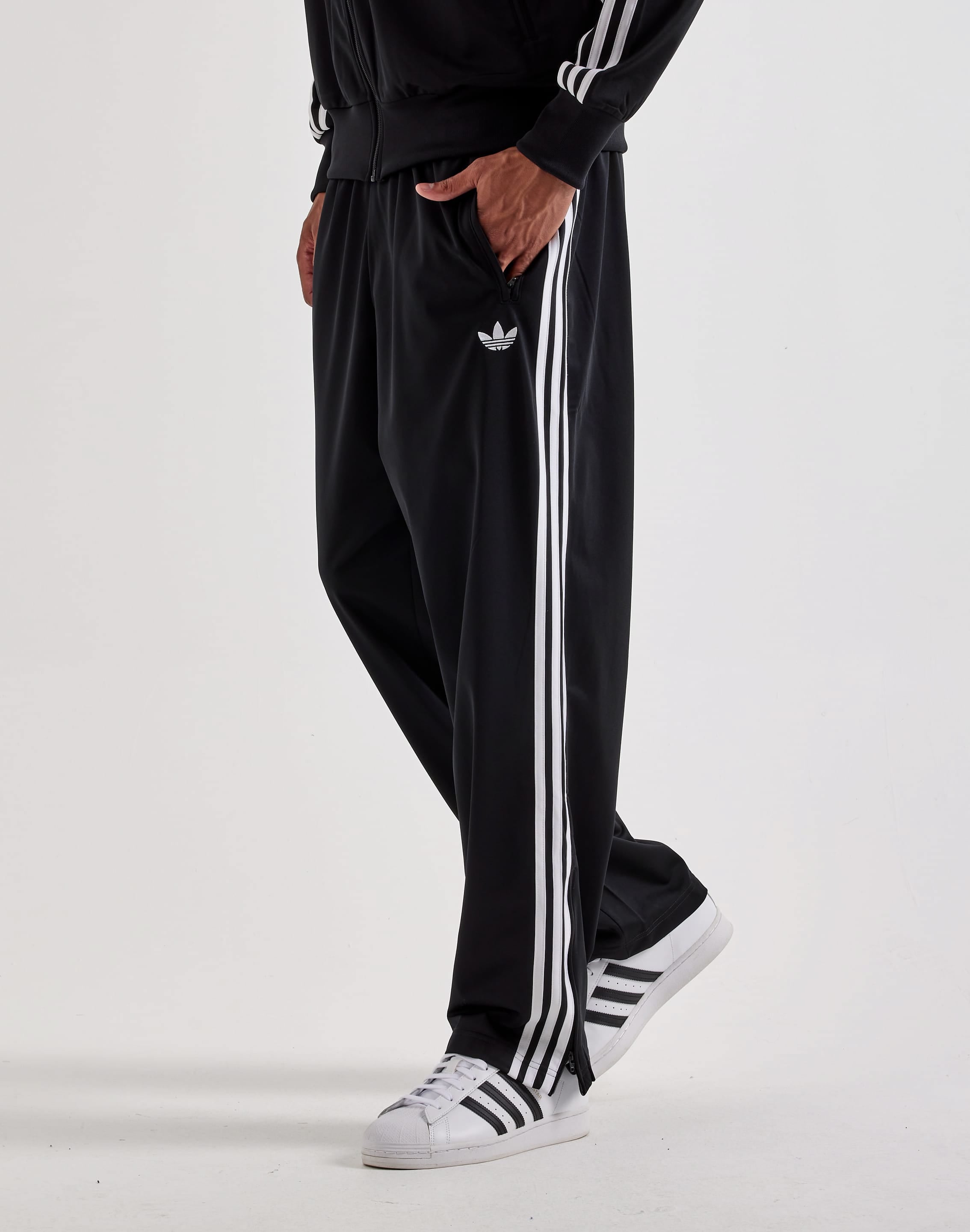 Photo of Adidas Firebird Track Pants