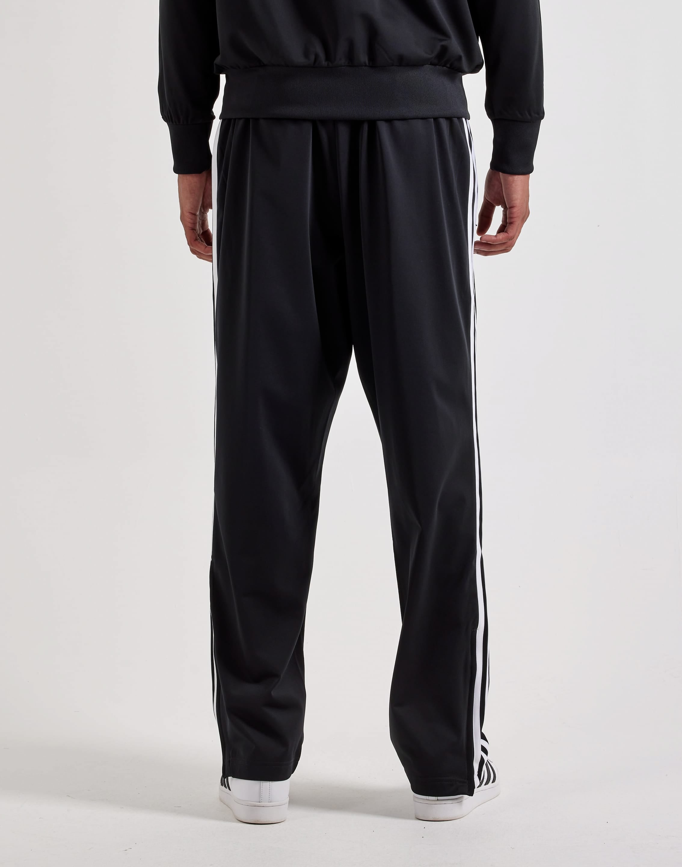 Photo of Adidas Firebird Track Pants