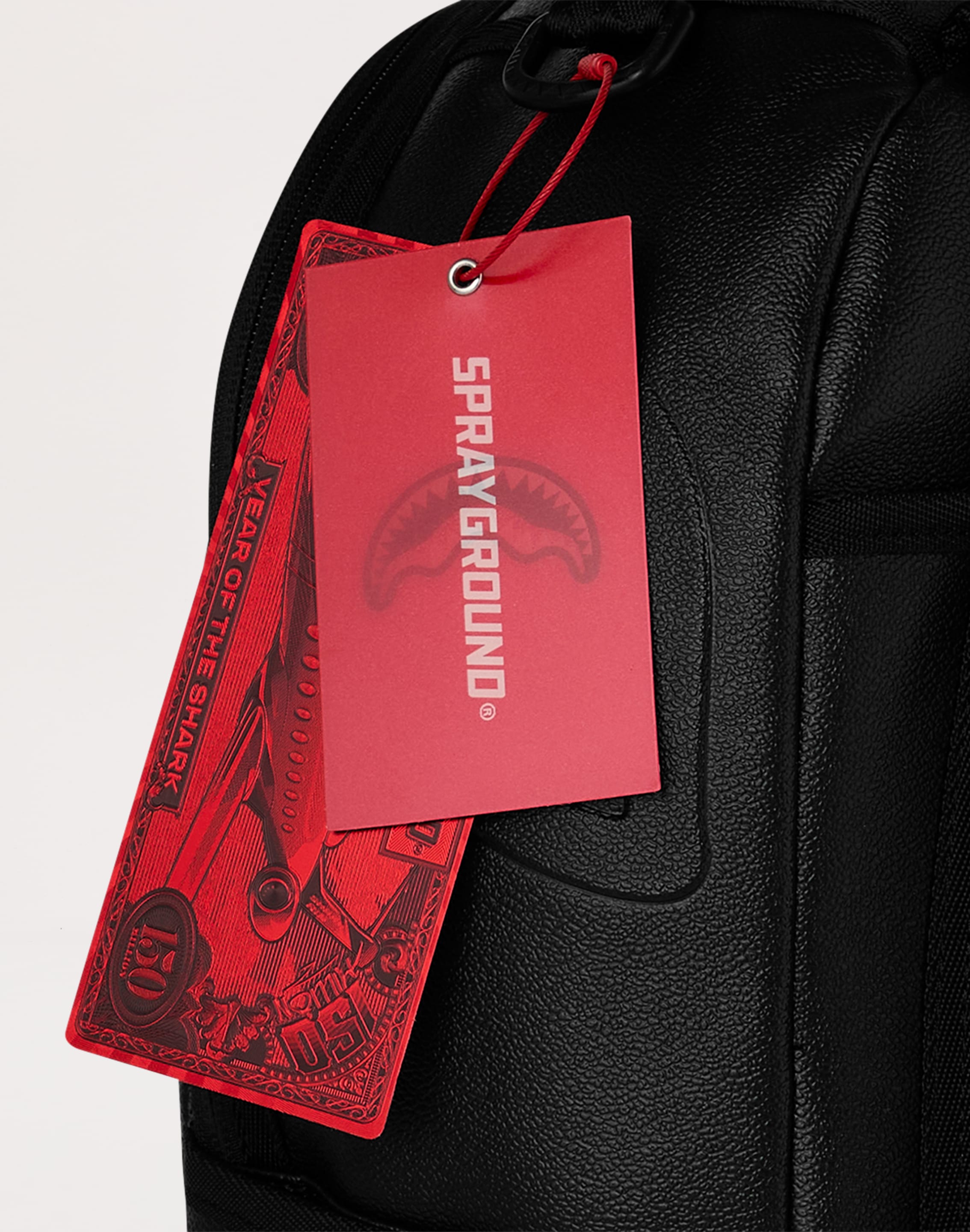 Photo of Sprayground Gold Brick Luxe Backpack