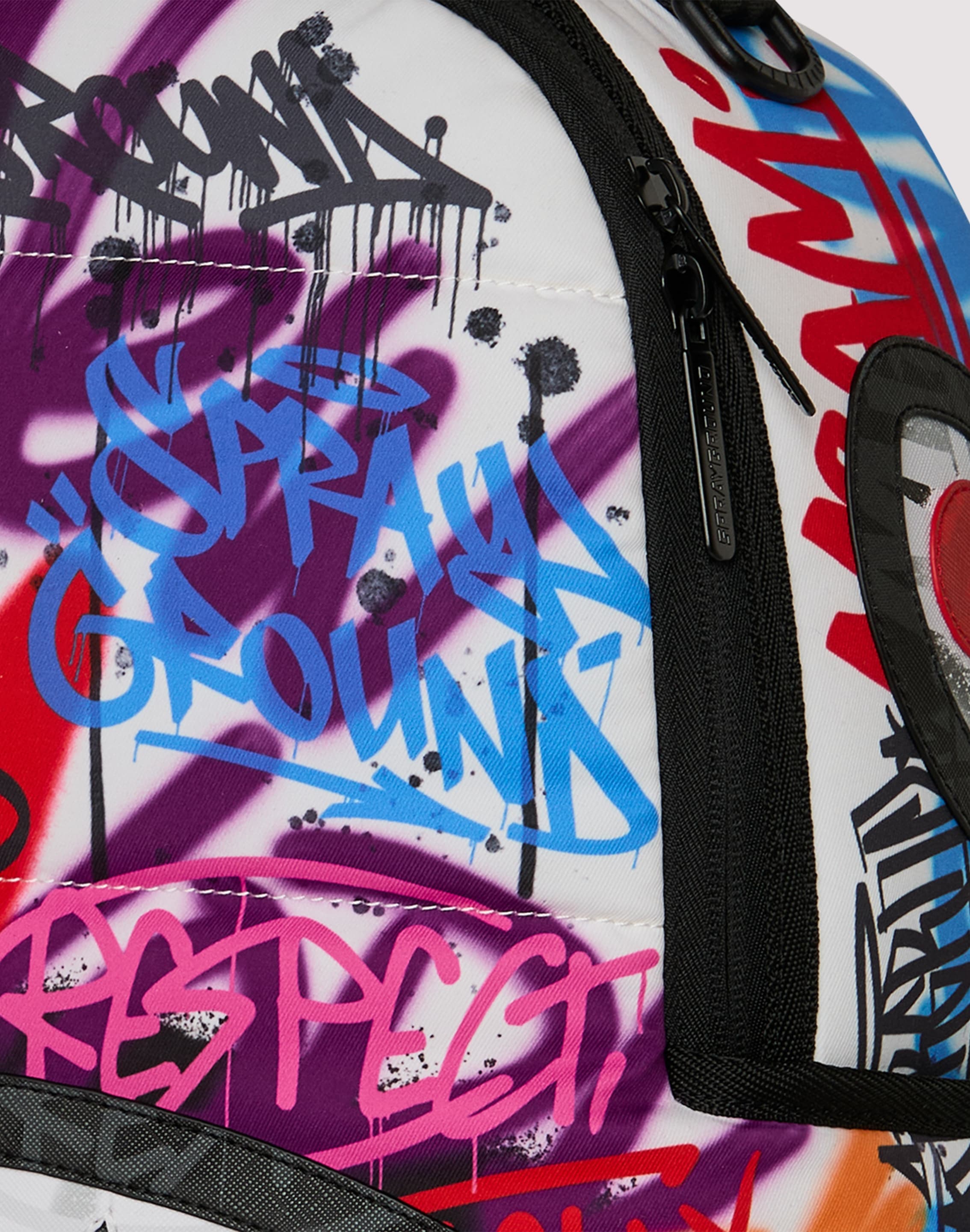 Photo of Sprayground Tagged Puffer Backpack