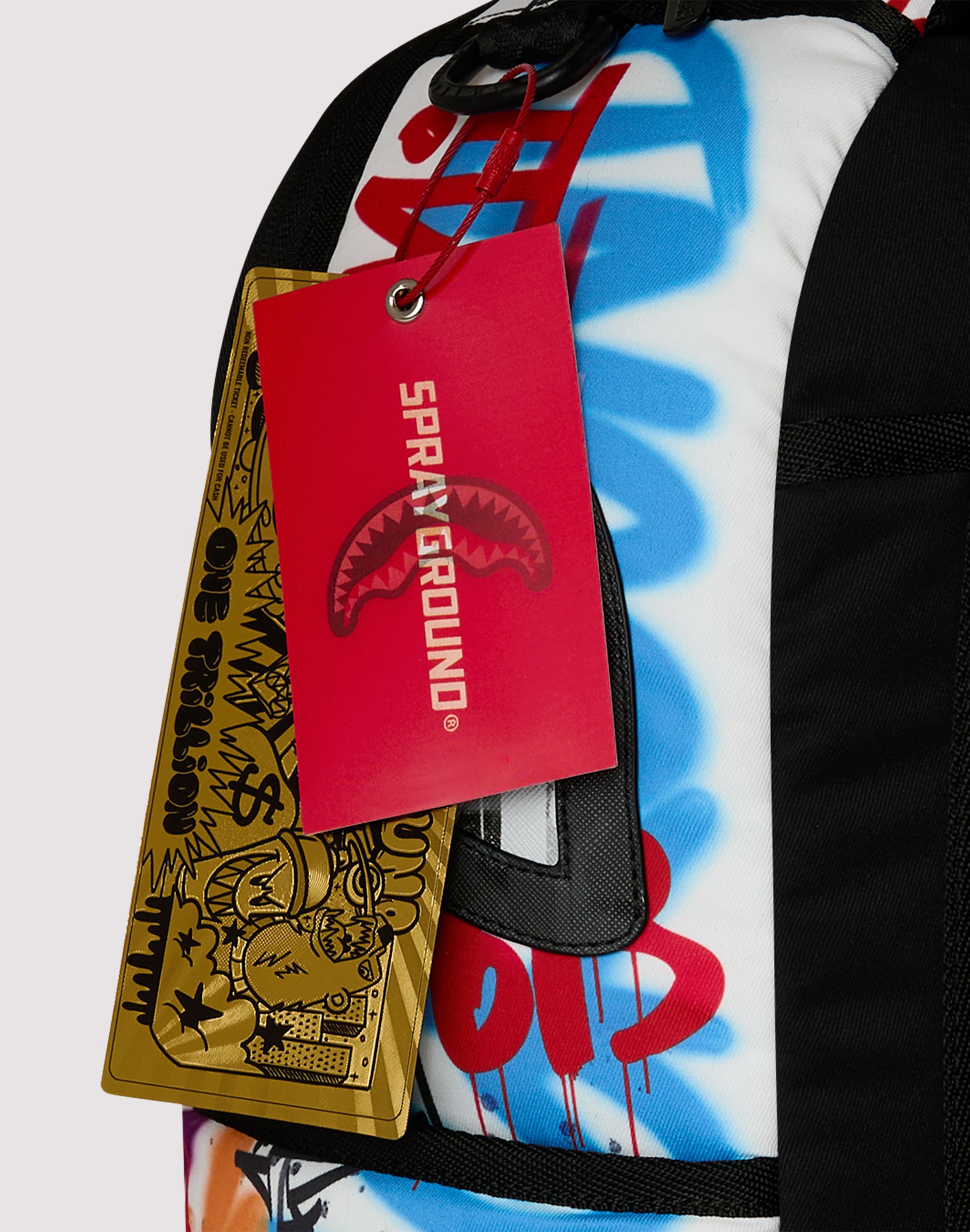 Photo of Sprayground Tagged Puffer Backpack