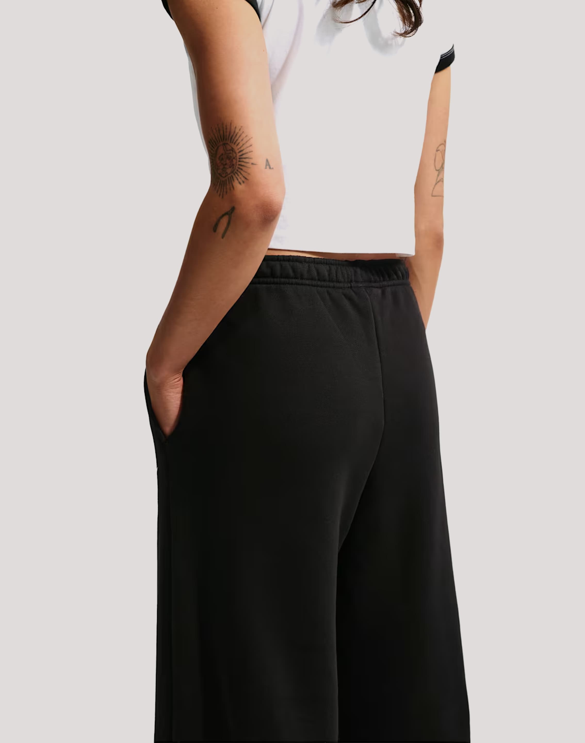 Photo of Nike Mid-Rise Wide-Leg Fleece Pants