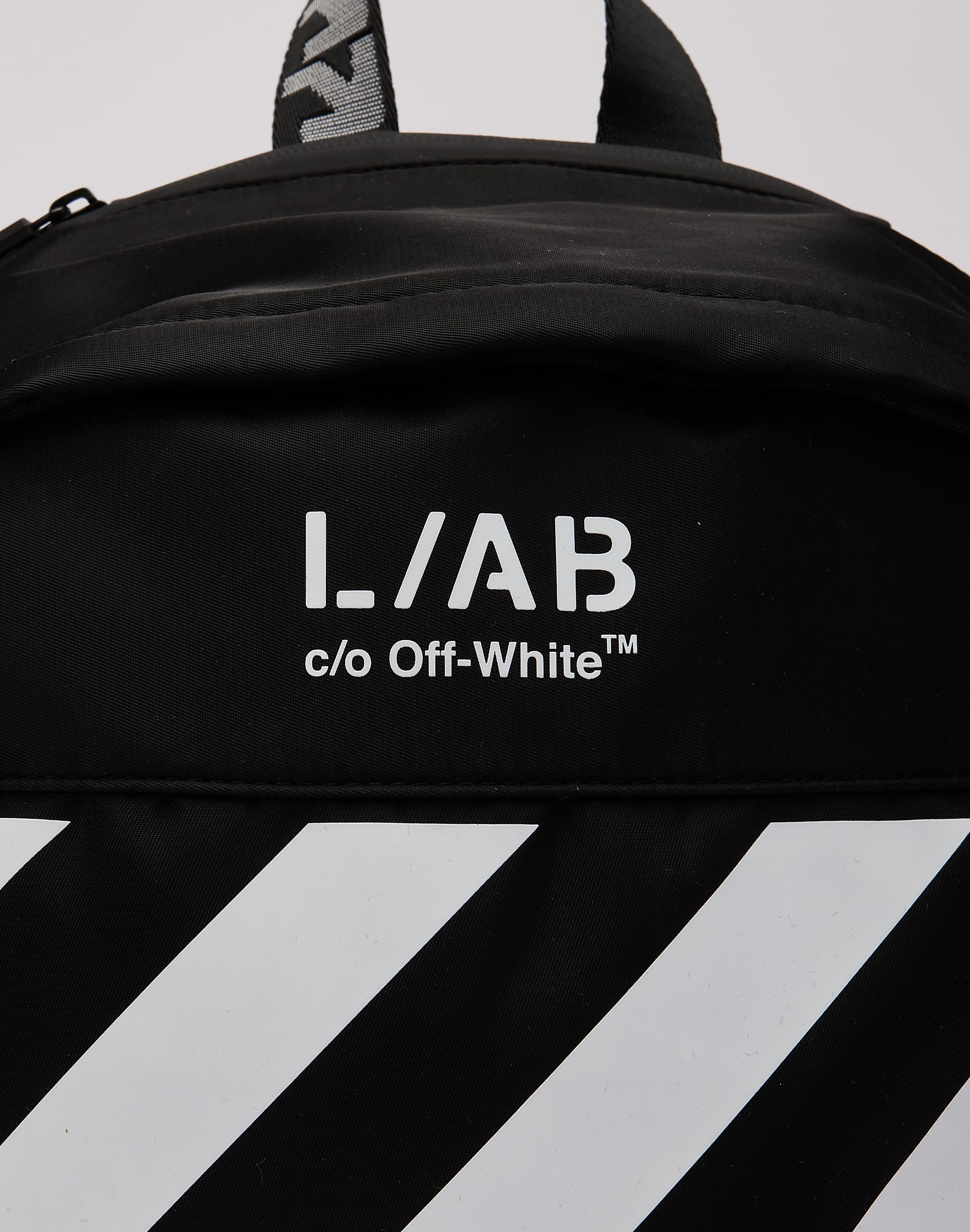 Photo of Off-White L/AB Diagonal Tab Backpack