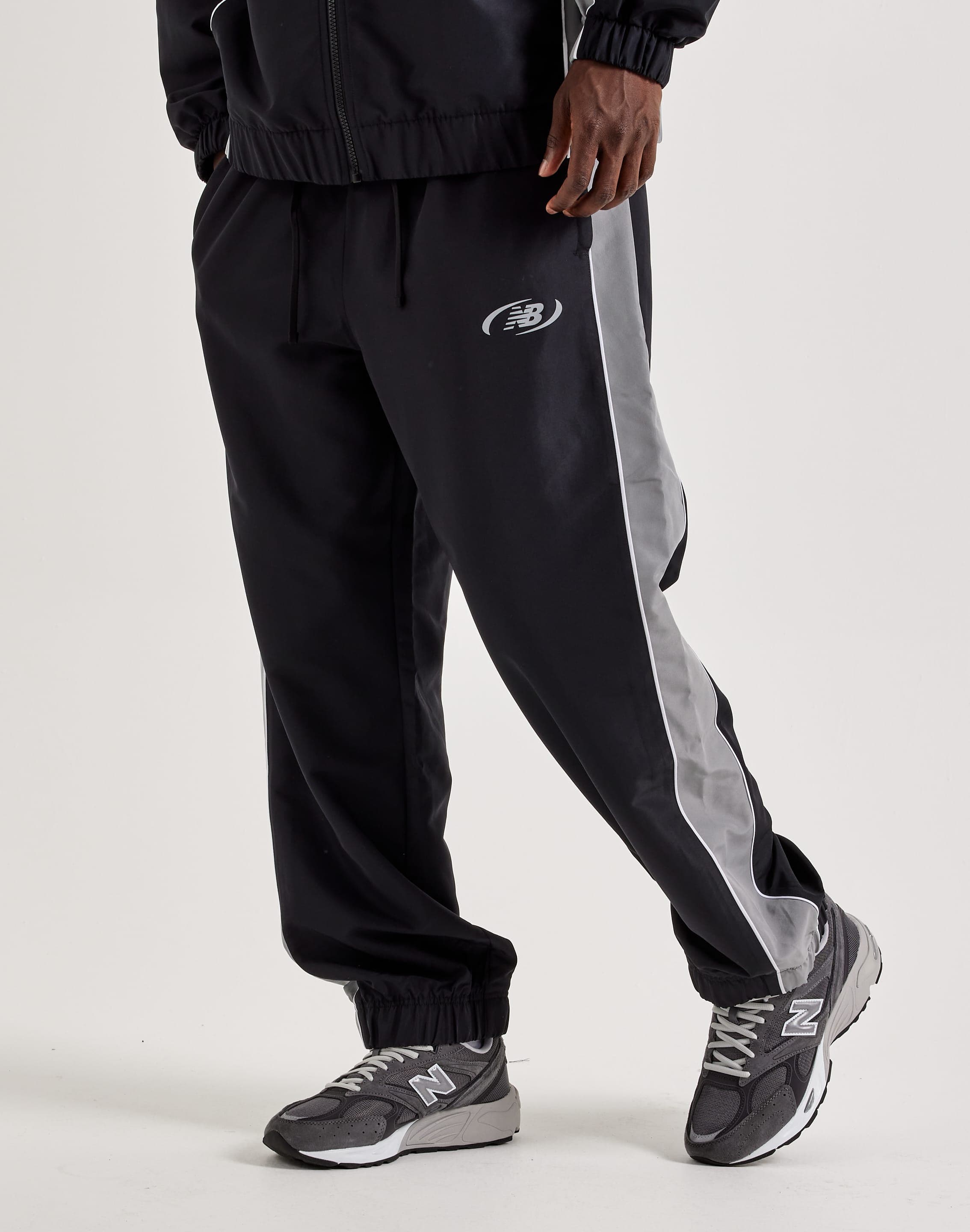 Photo of New Balance Trackside Woven Pants