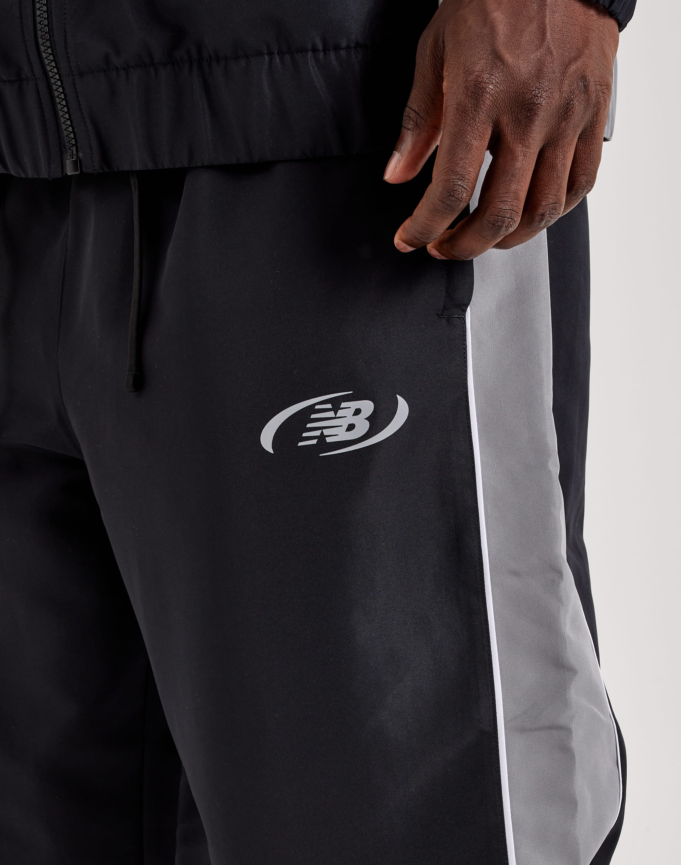 Photo of New Balance Trackside Woven Pants