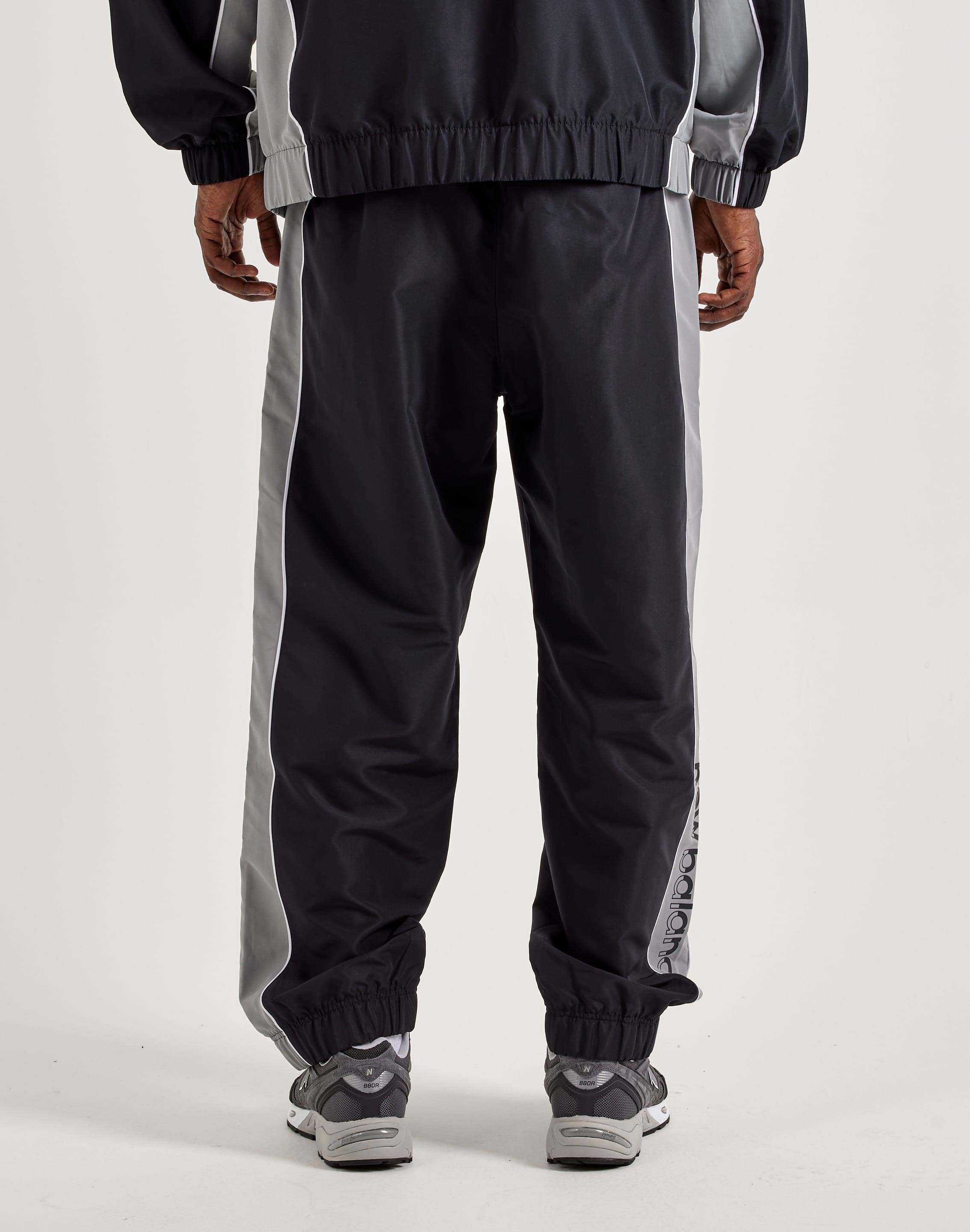 Photo of New Balance Trackside Woven Pants