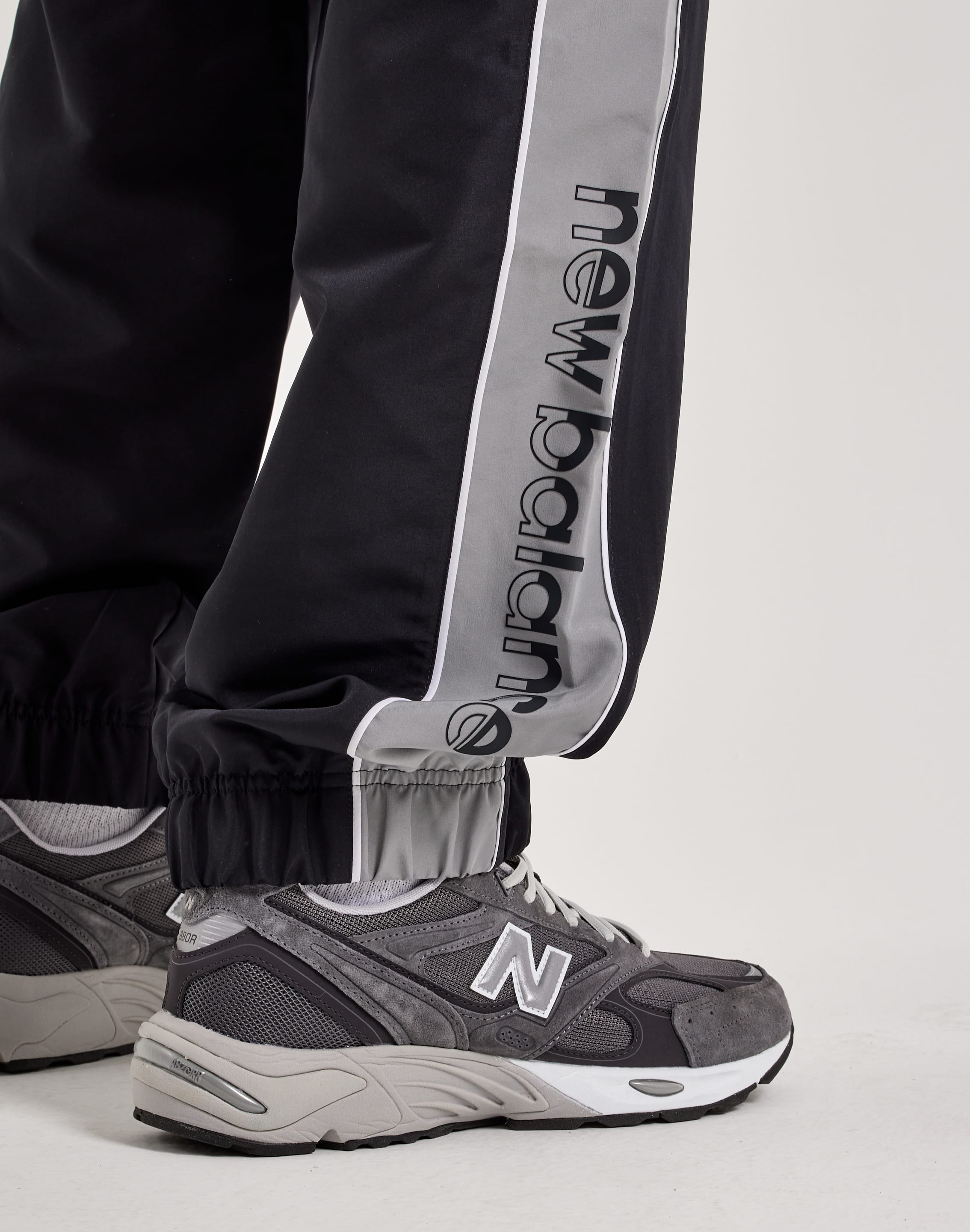 Photo of New Balance Trackside Woven Pants