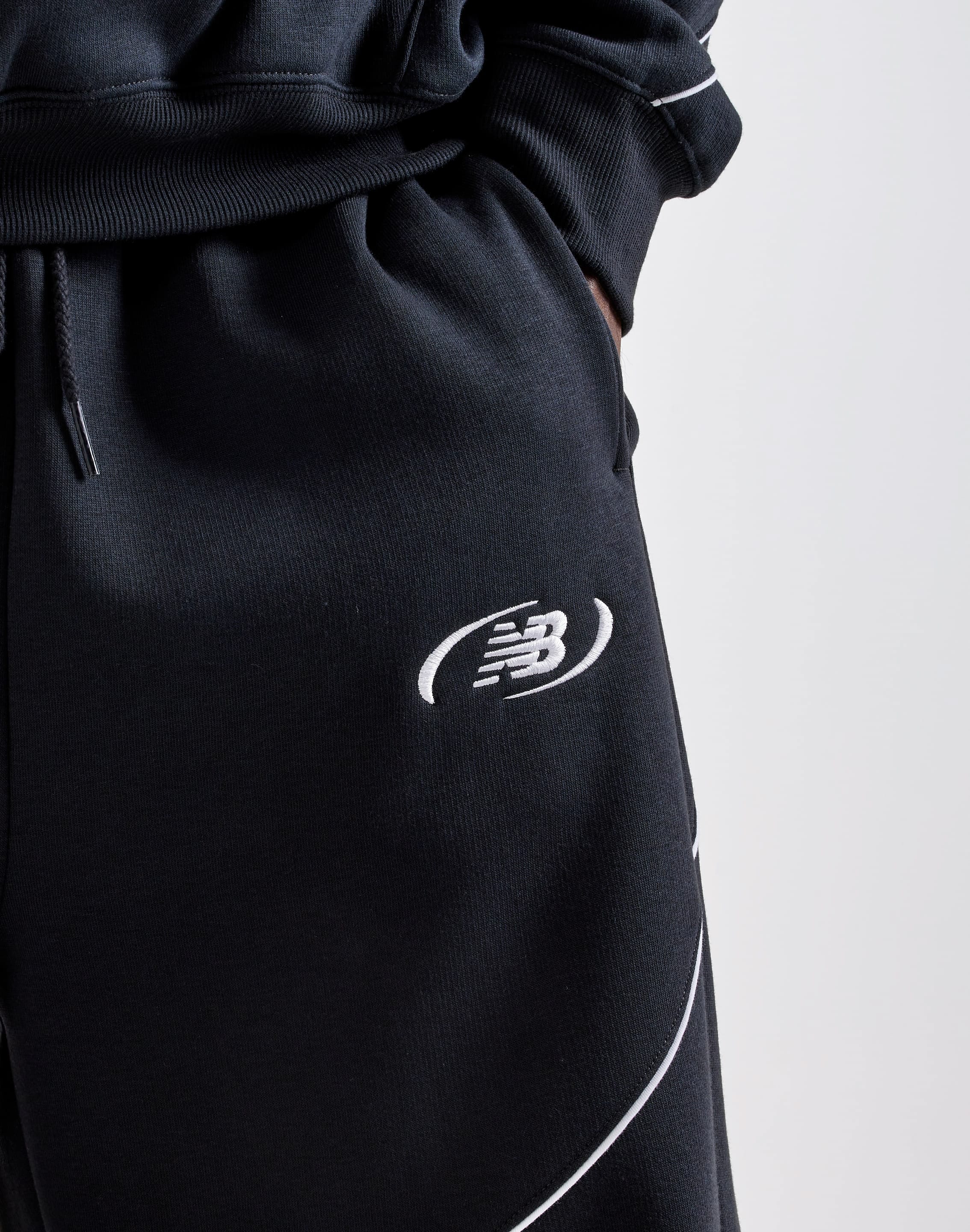 Photo of New Balance Trackside Fleece Open-Hem Pants