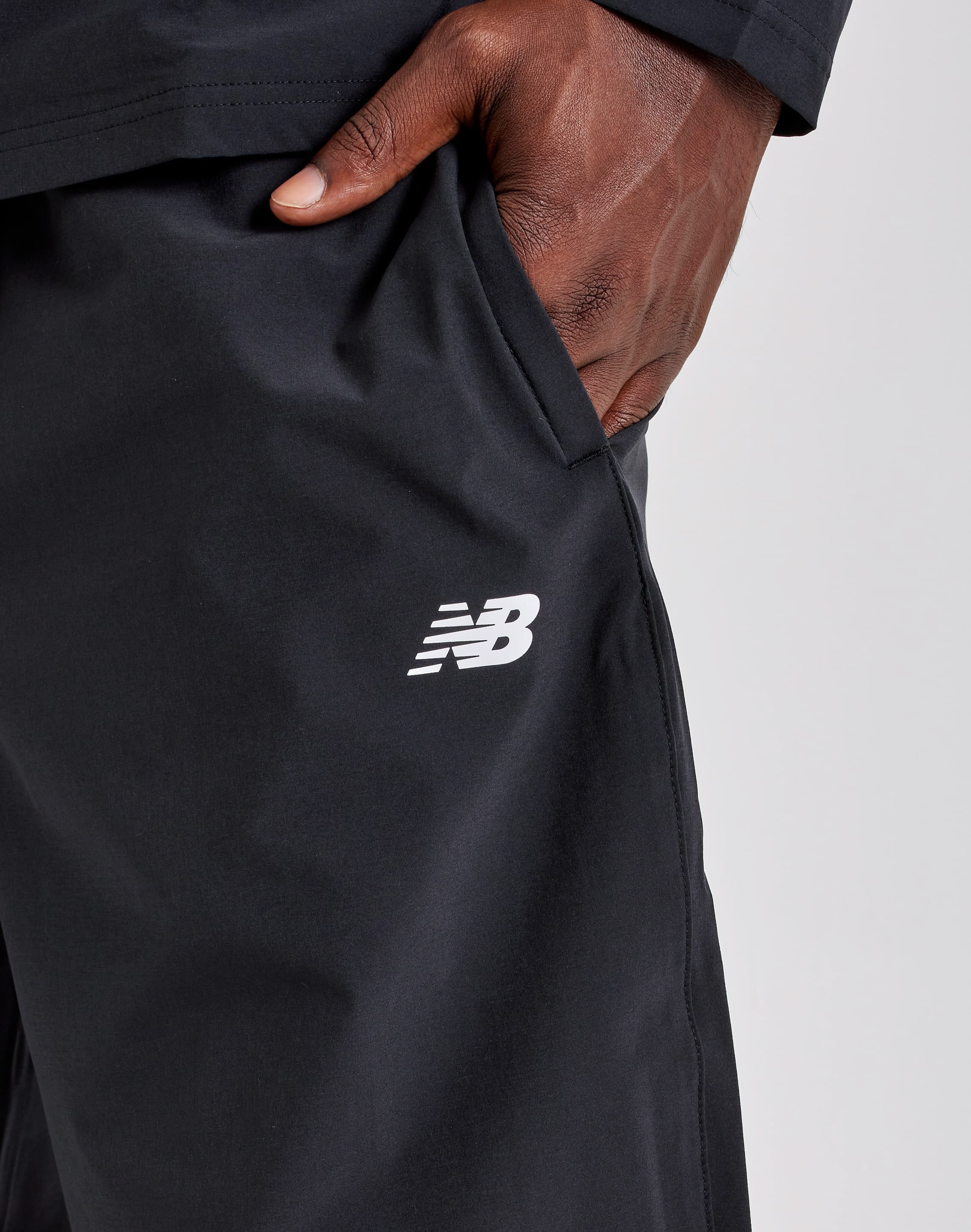 Photo of New Balance Stretch Woven Open-Hem Pants