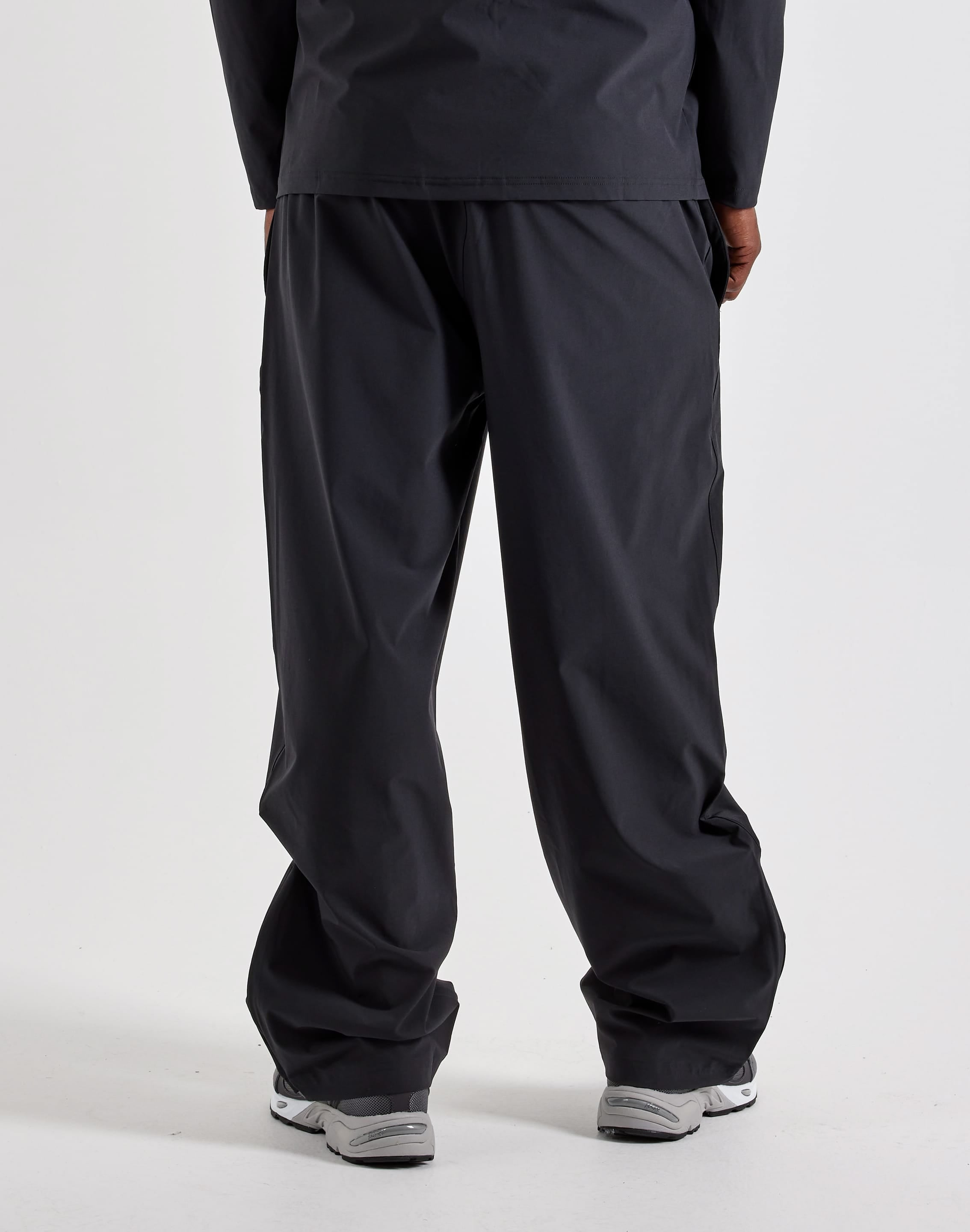 Photo of New Balance Stretch Woven Open-Hem Pants