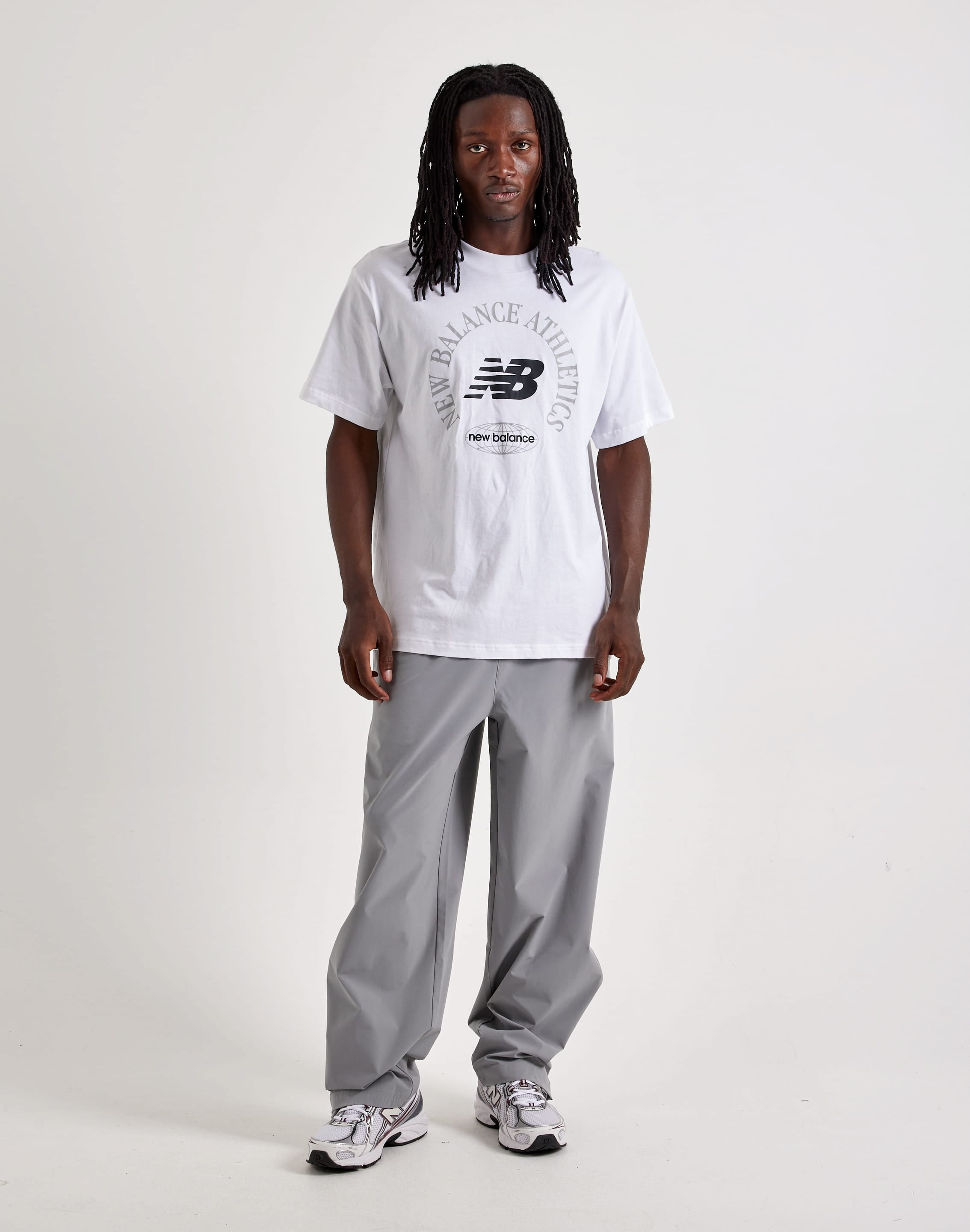 Photo of New Balance Stretch Woven Open-Hem Pants