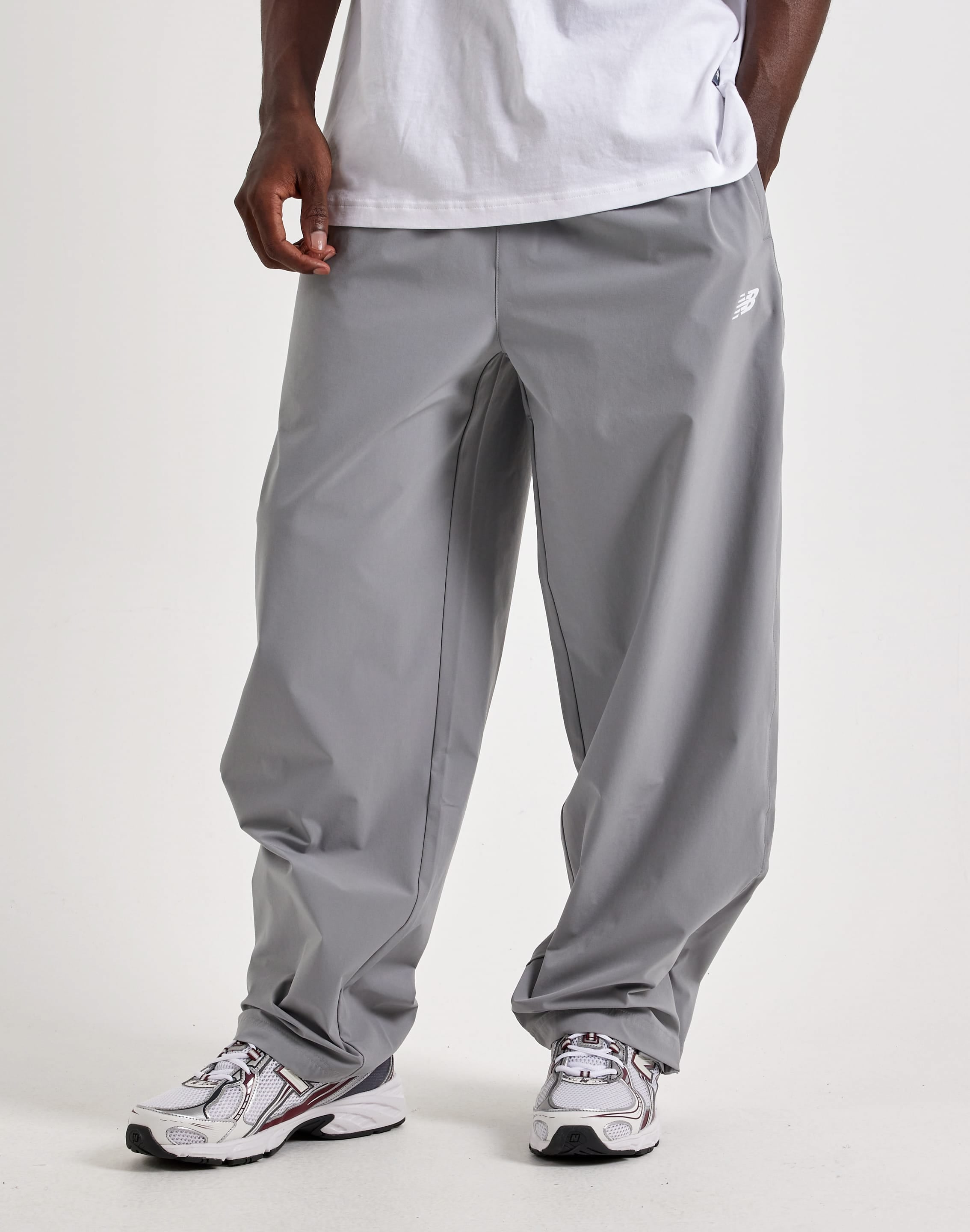 Photo of New Balance Stretch Woven Open-Hem Pants