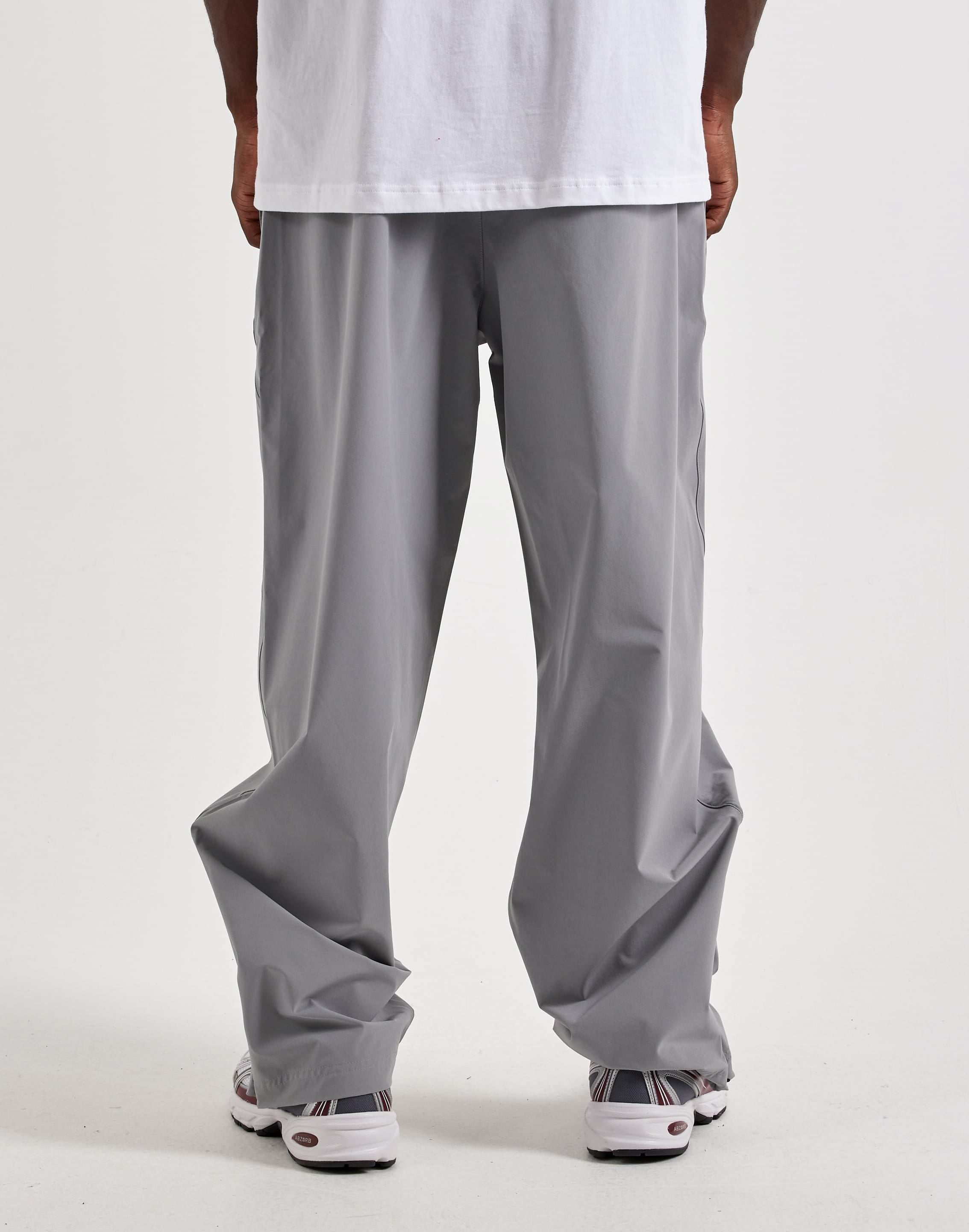 Photo of New Balance Stretch Woven Open-Hem Pants