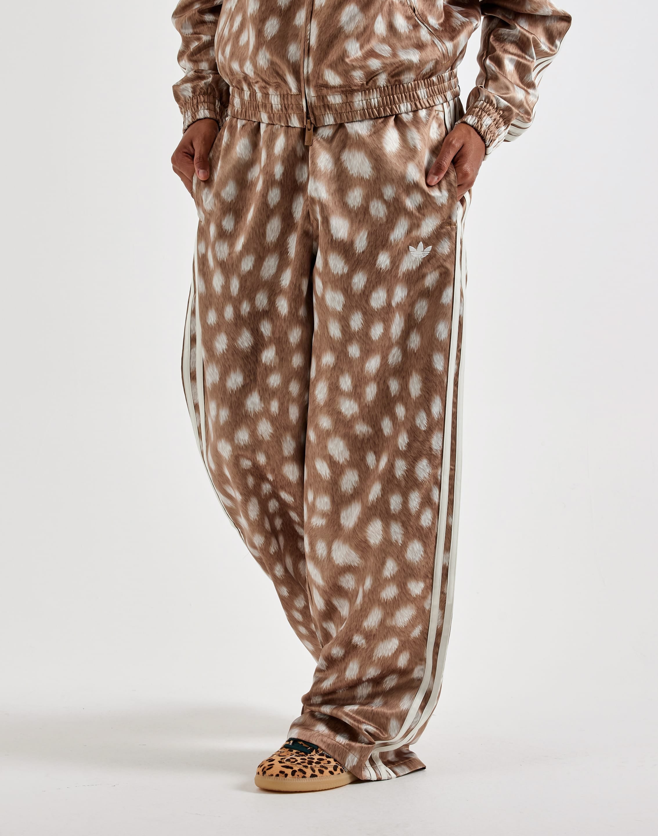Photo of Adidas Animal Print Firebird Track Pants