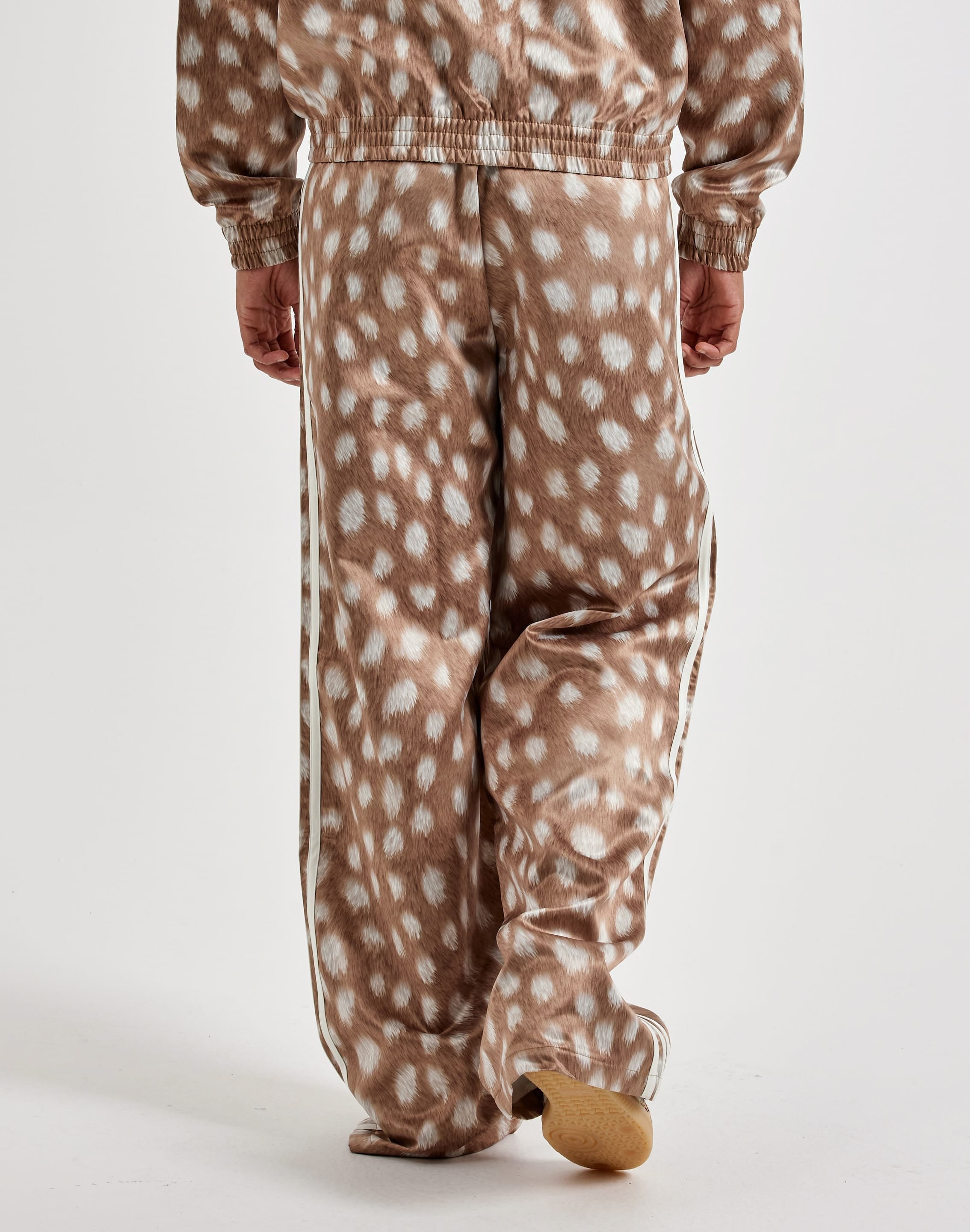 Photo of Adidas Animal Print Firebird Track Pants