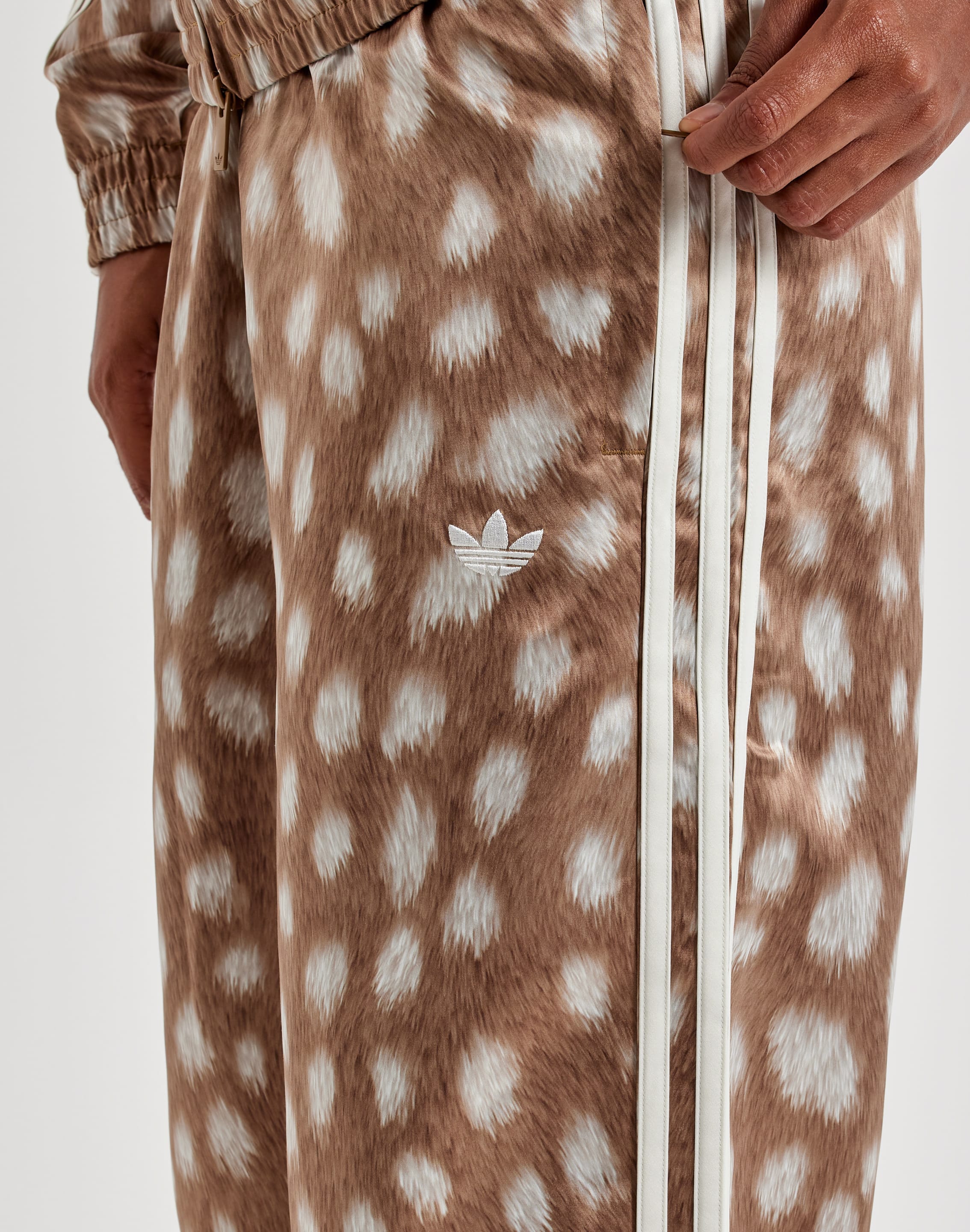 Photo of Adidas Animal Print Firebird Track Pants