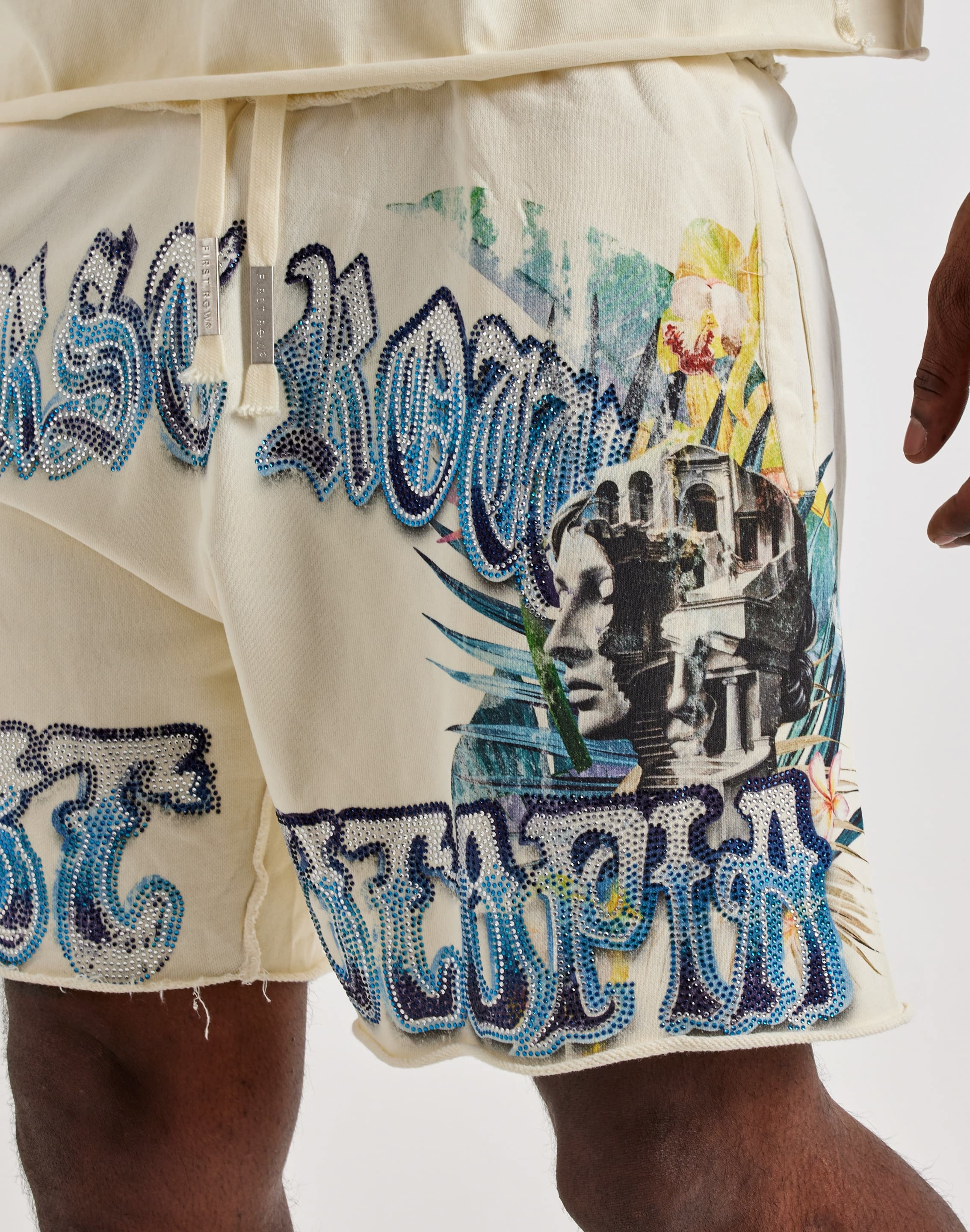 Photo of First Row Lost Utopia Rhinestone Fleece Shorts