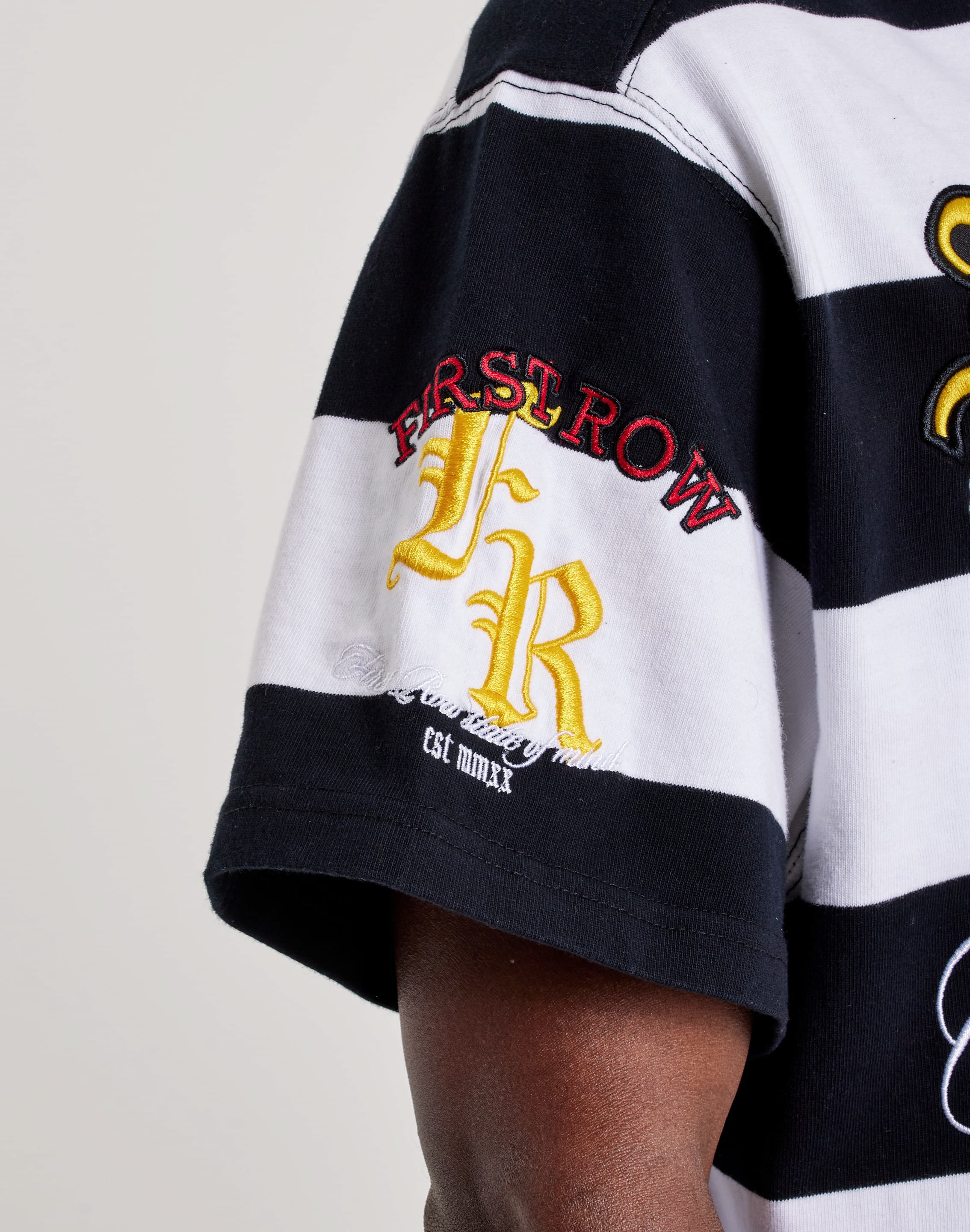 Photo of First Row Patch Polo Shirt