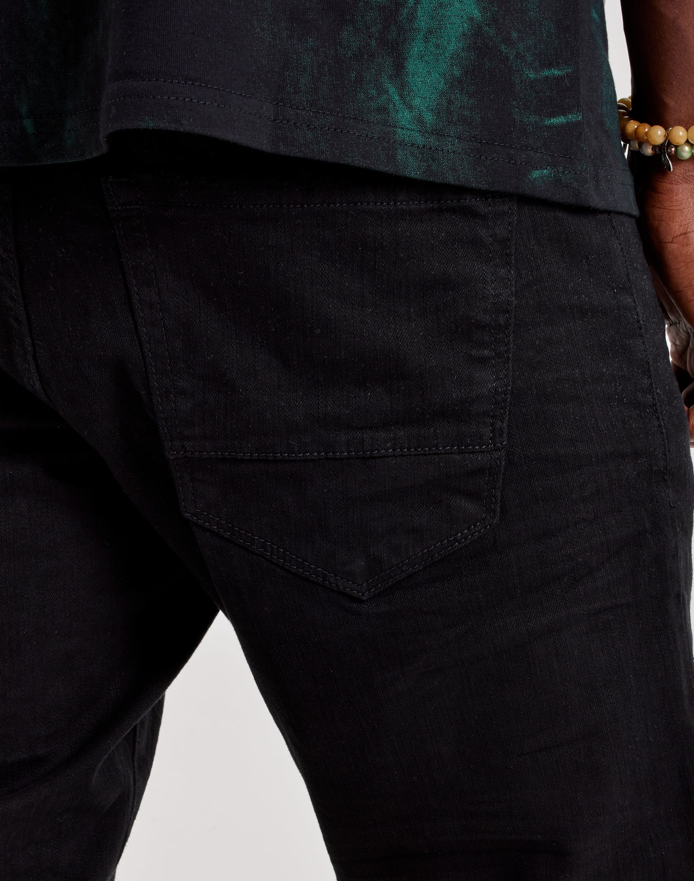 Photo of Jordan Craig Ross Slim Distressed Denim Jeans