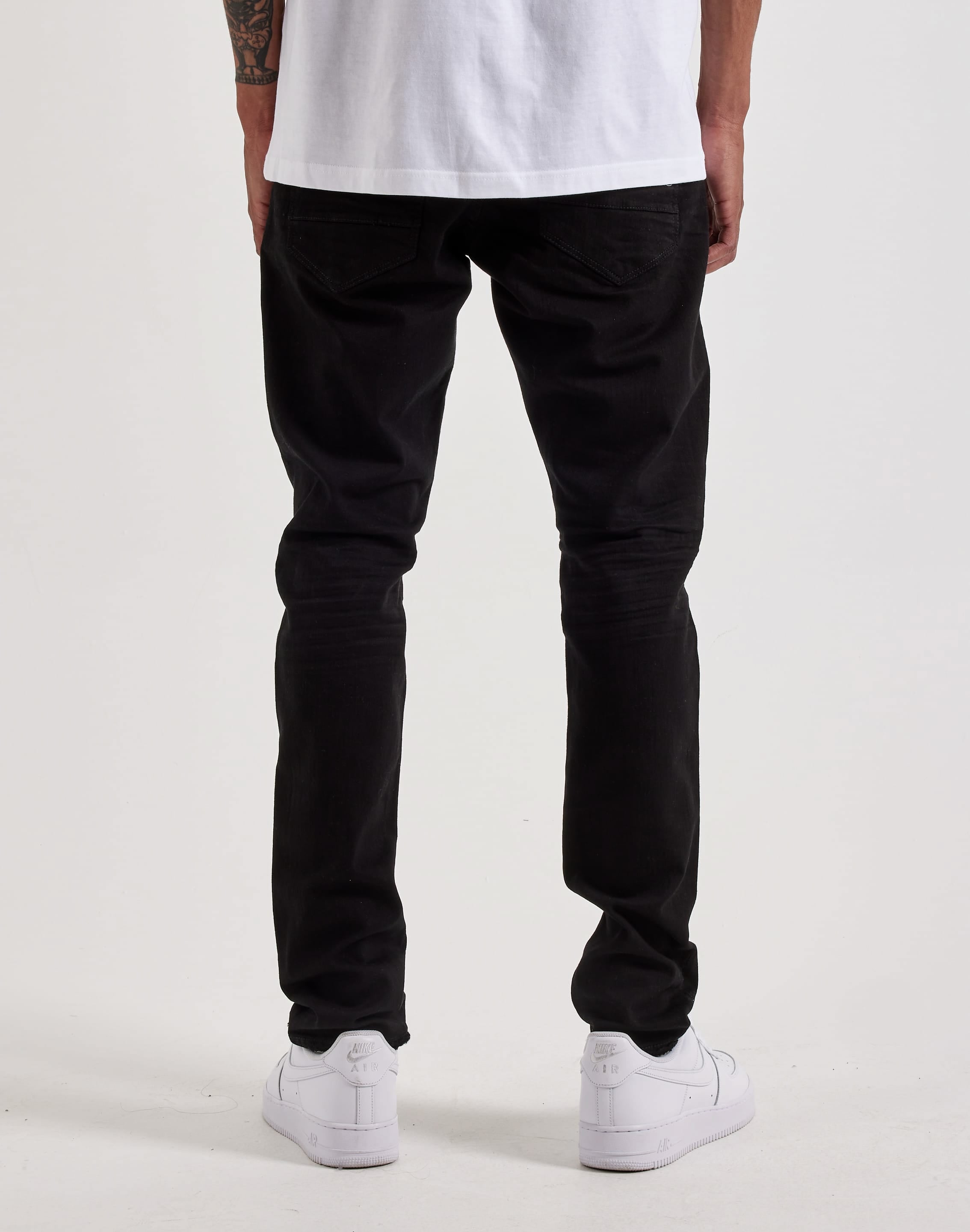 Photo of Jordan Craig Slim Distressed Denim Jeans