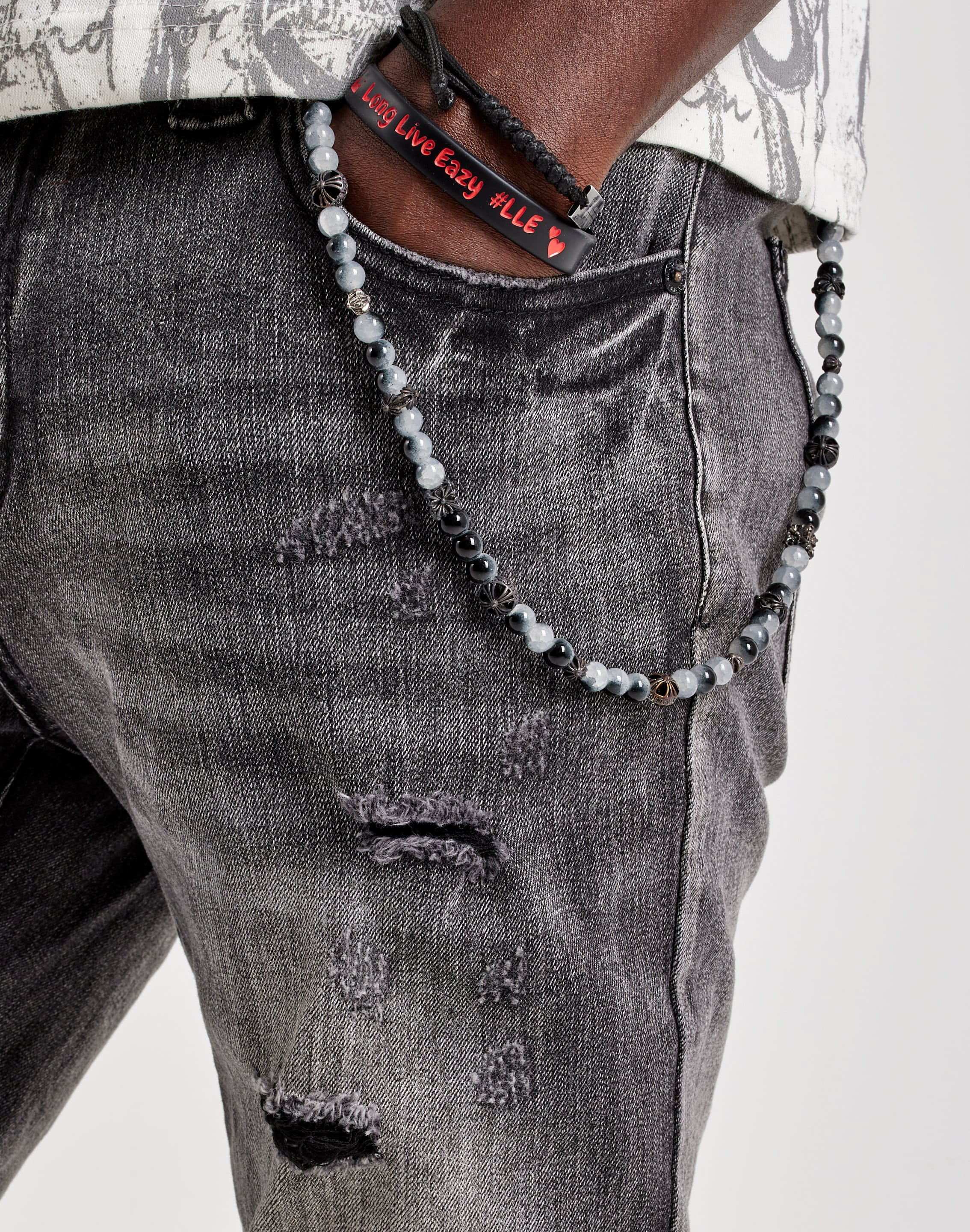 Photo of Kilogram Embossed Keychain Distressed Slim Denim Jeans