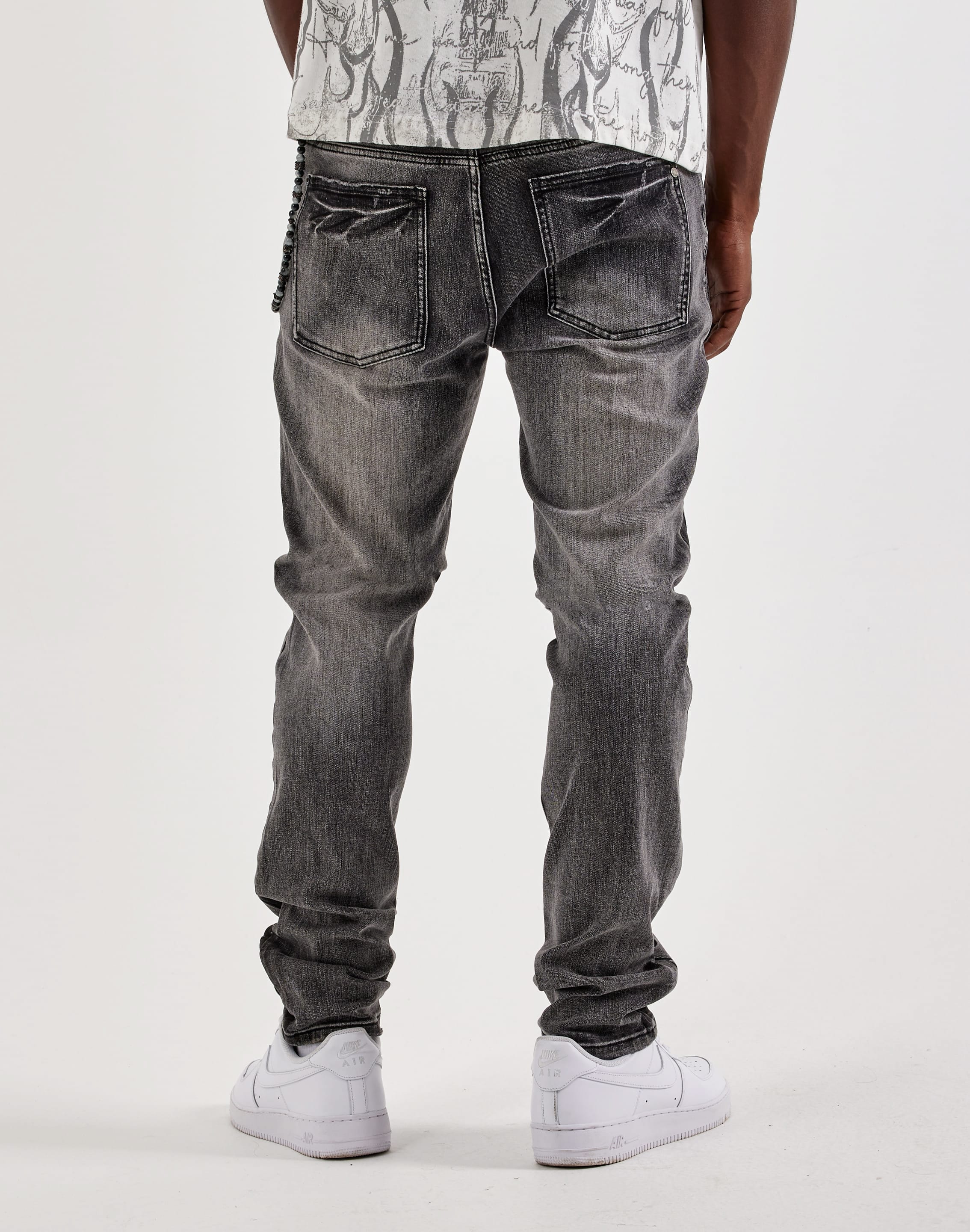 Photo of Kilogram Embossed Keychain Distressed Slim Denim Jeans