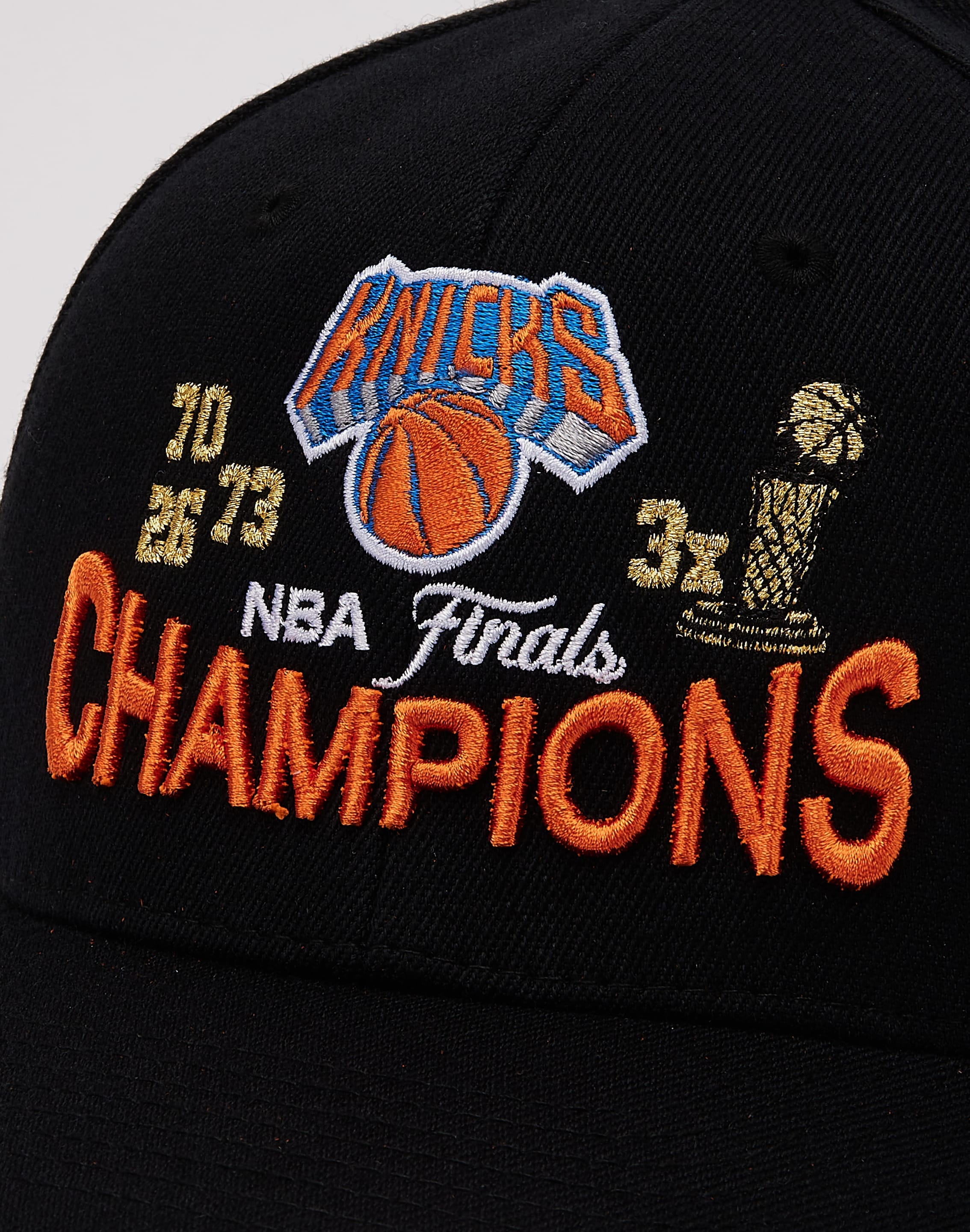 Photo of Mitchell & Ness NBA New York Knicks Champions Trophy Stretch Snapback Hat
