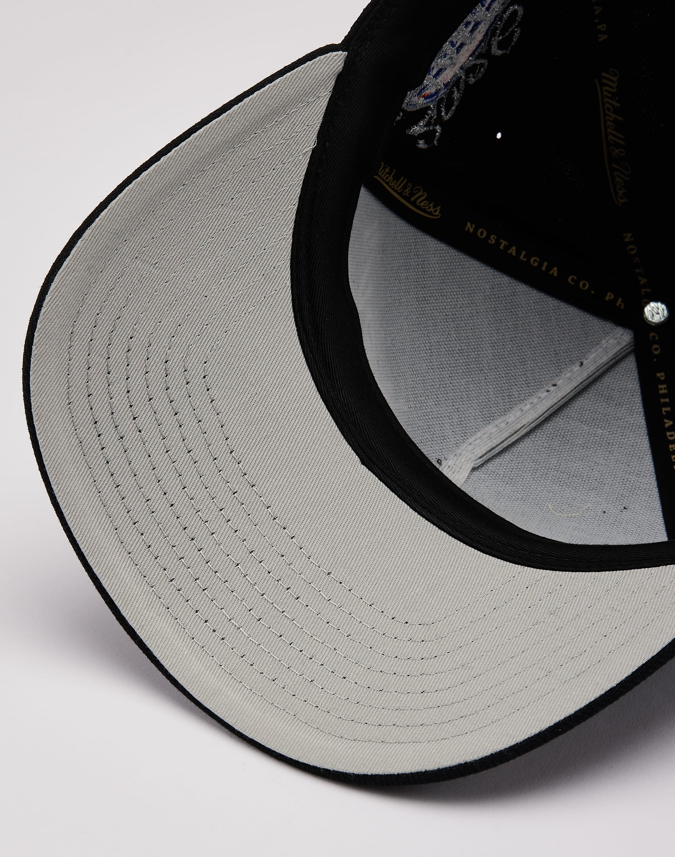 Photo of Mitchell & Ness NBA New York Knicks Blast Over Pro Pinch Snapback Hat