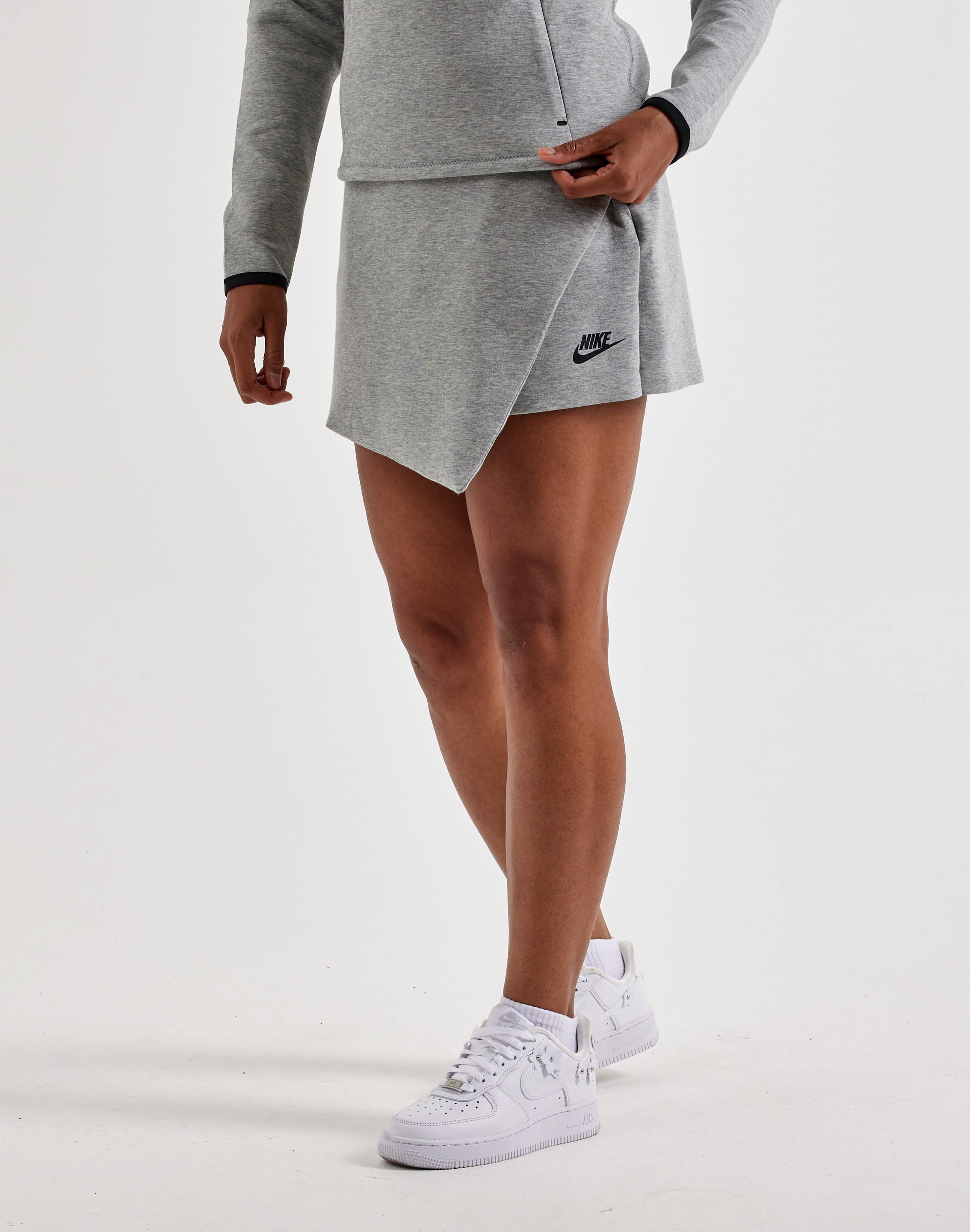 Photo of Nike Tech Fleece Mid-Rise Skort