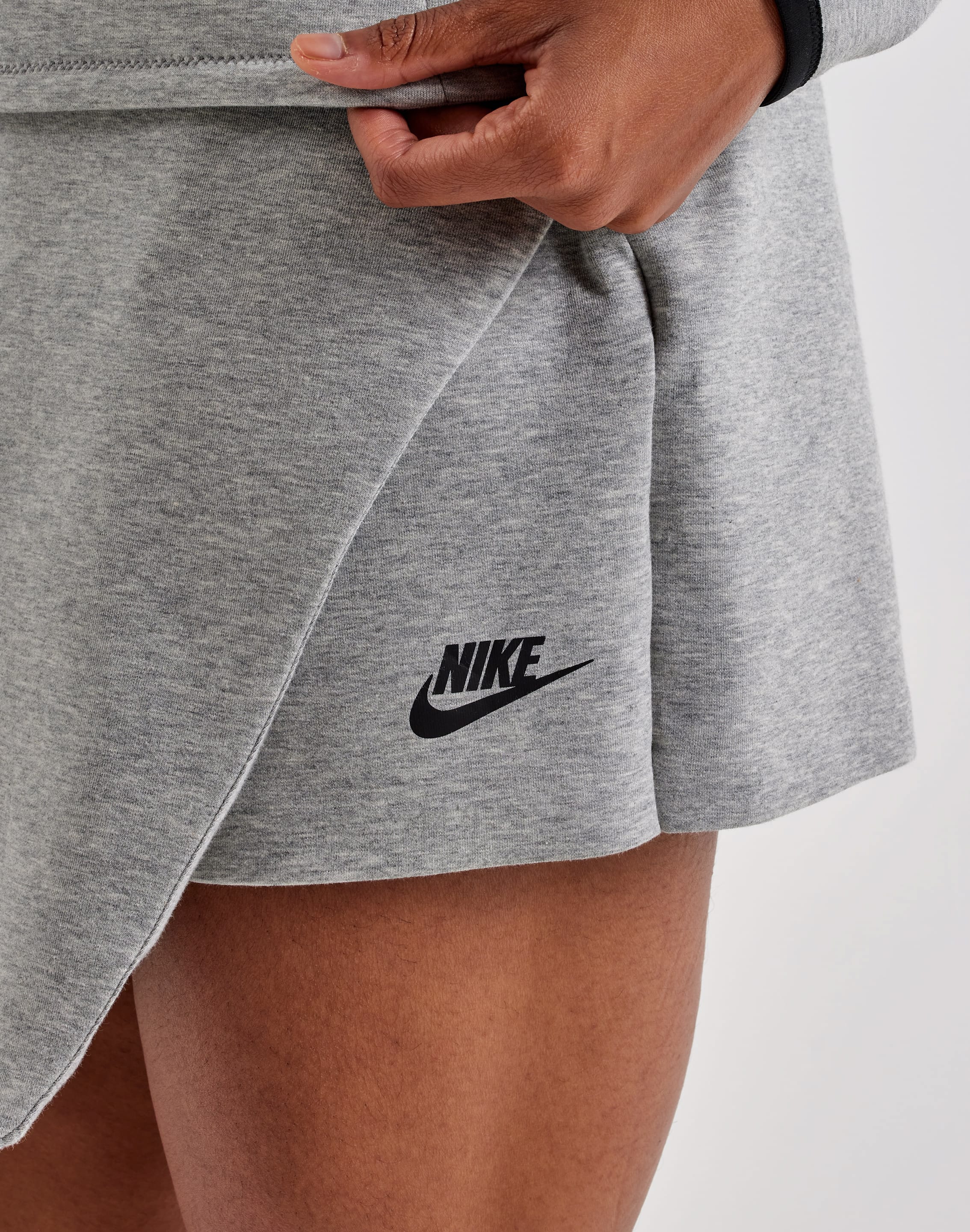 Photo of Nike Tech Fleece Mid-Rise Skort
