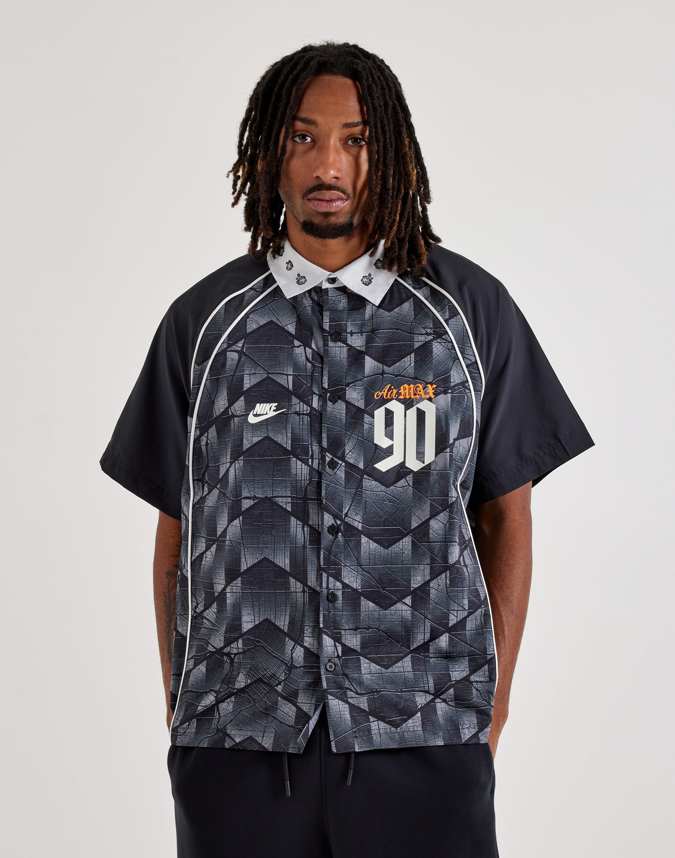 Photo of Nike Dri-FIT Bowler Skate Top