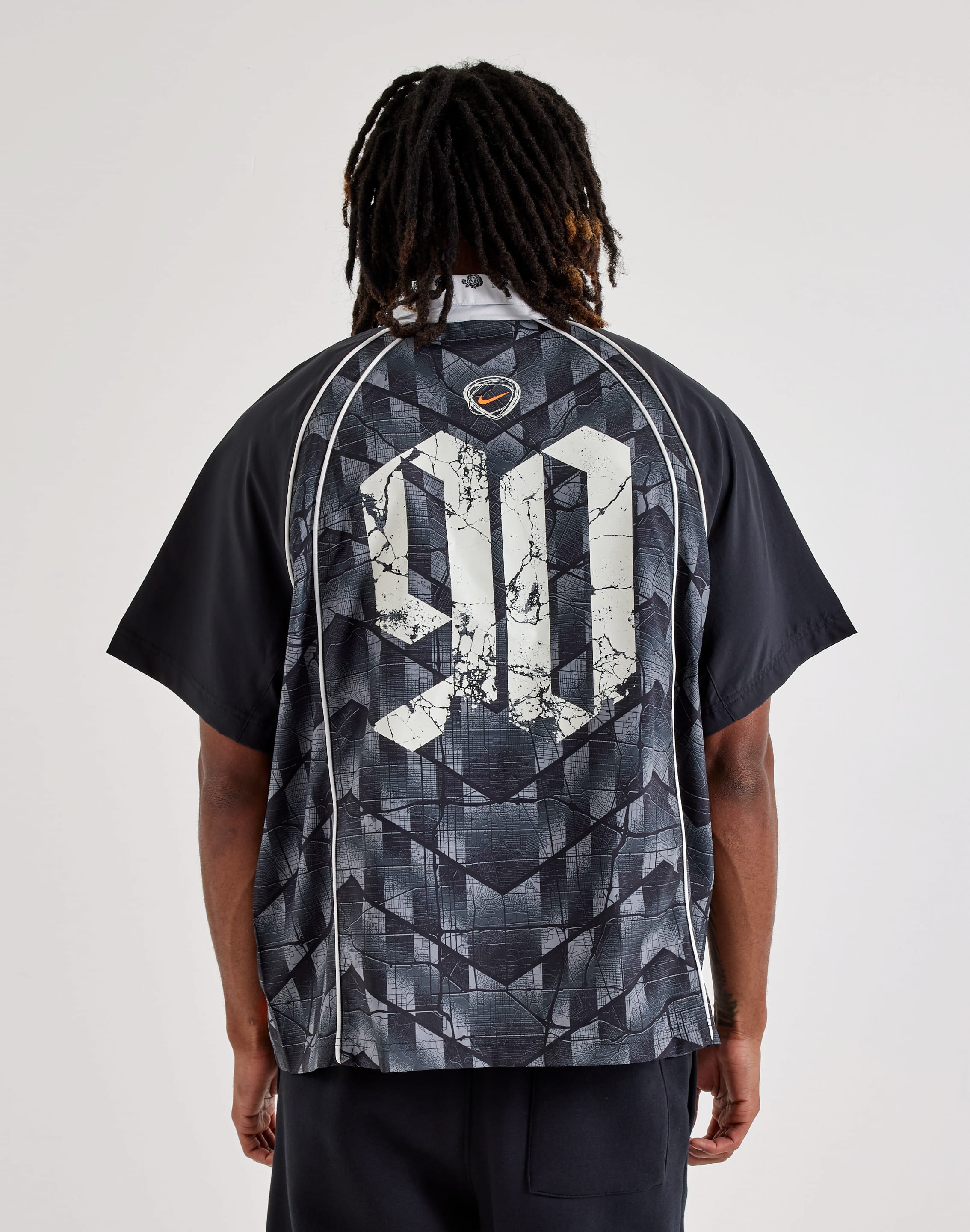 Photo of Nike Dri-FIT Bowler Skate Top