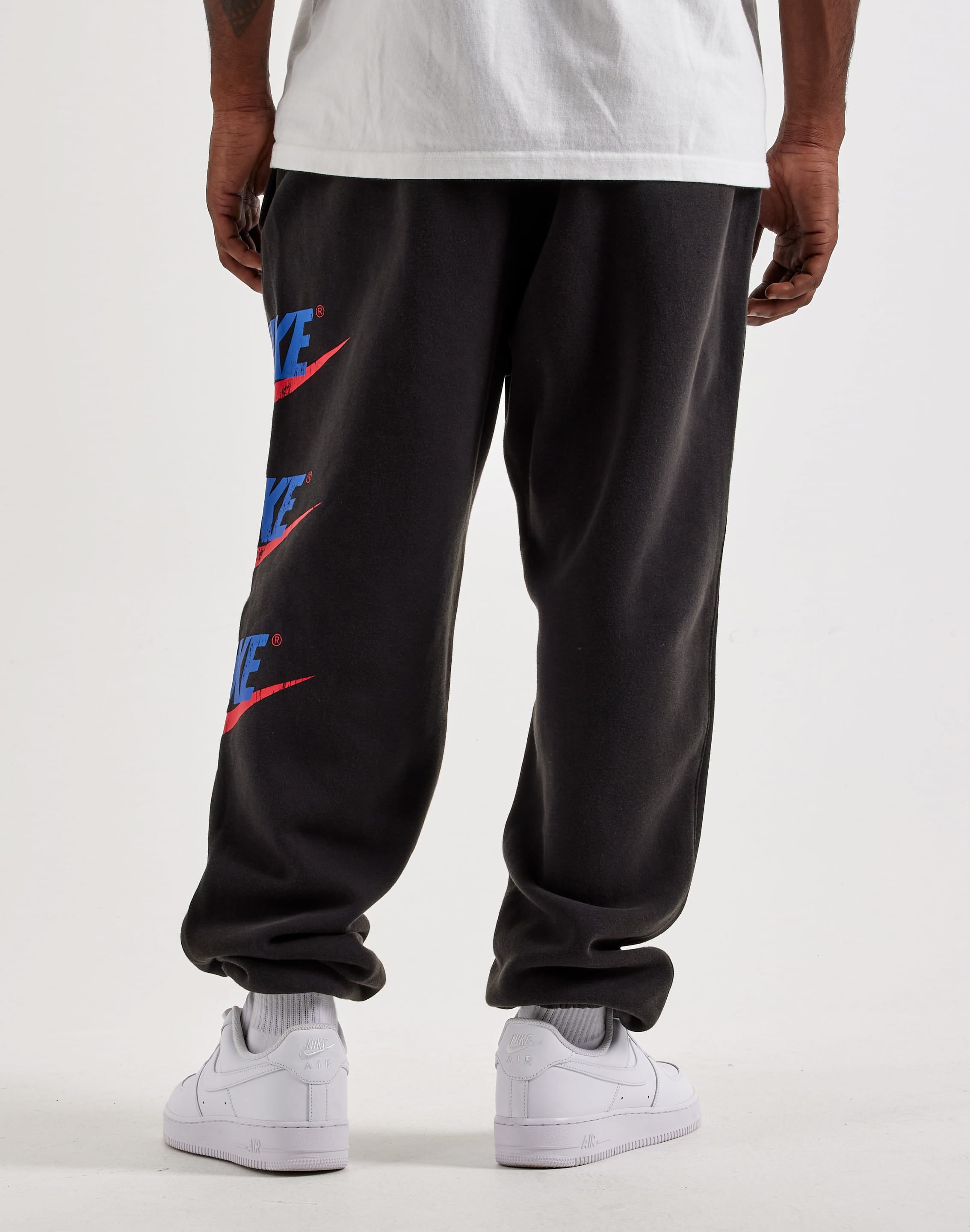 Photo of Nike Club Fleece Graphic Cuff Pants