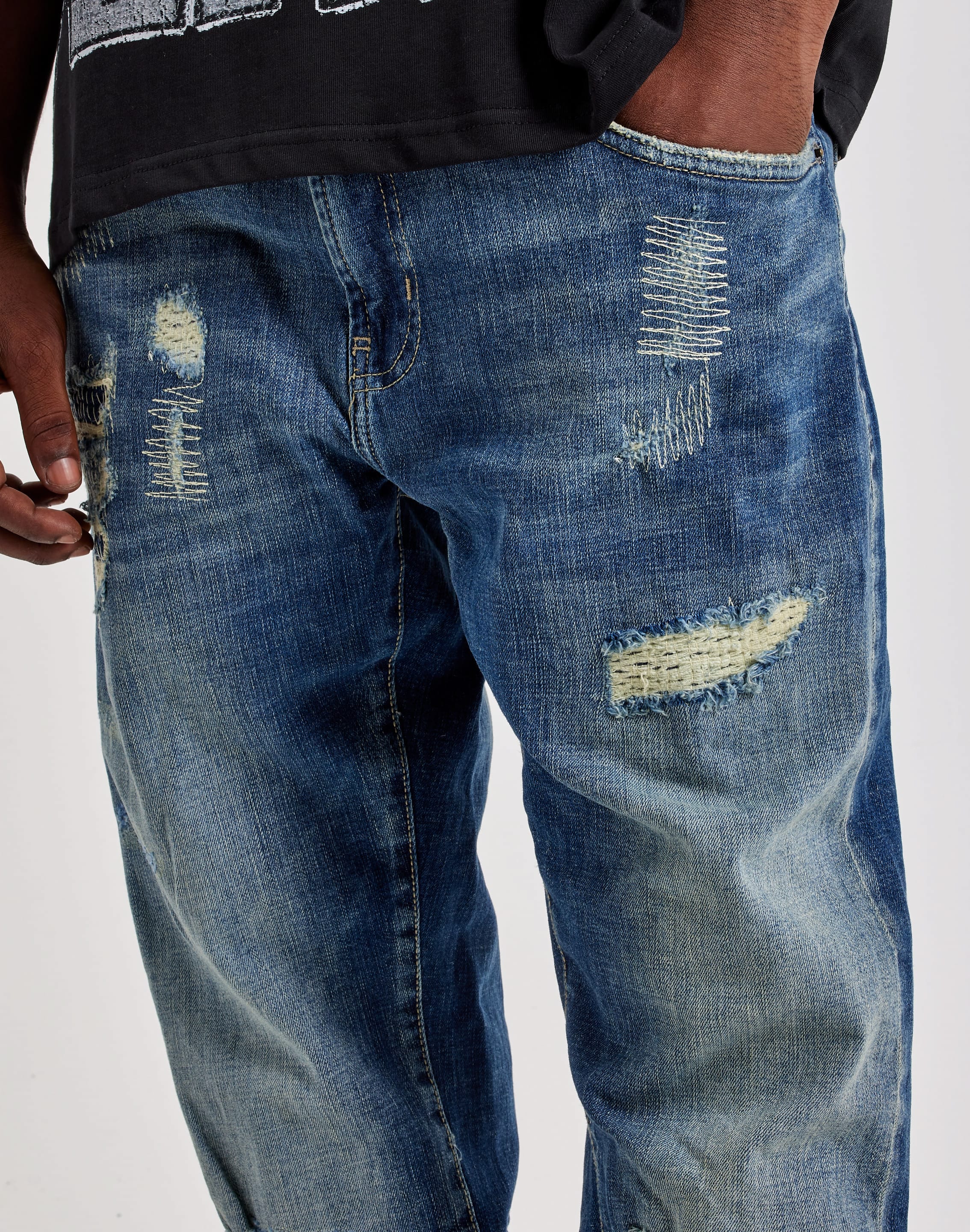 Photo of Preme Slim Distressed Denim Jeans