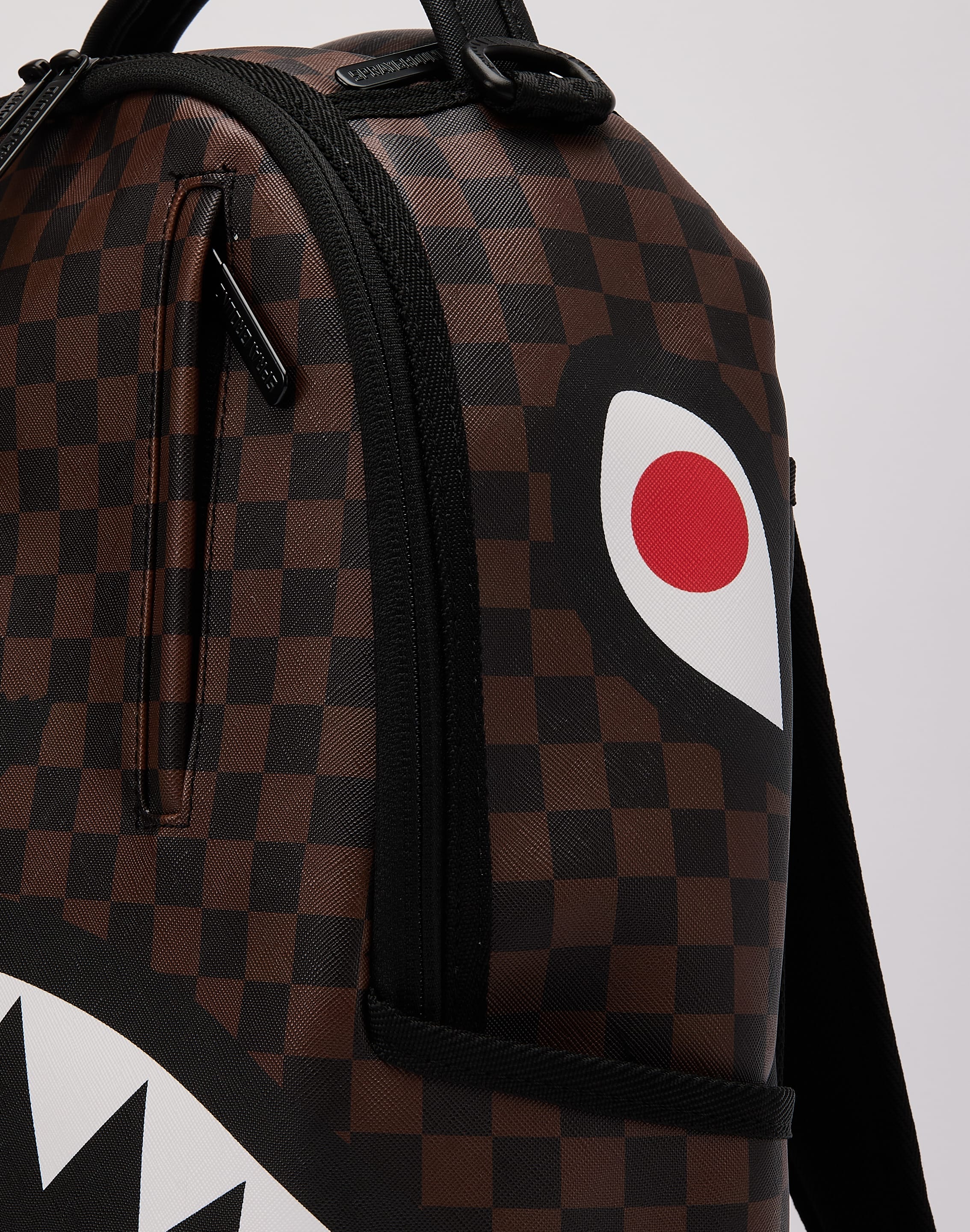 Photo of Sprayground Claw Tear Check Backpack