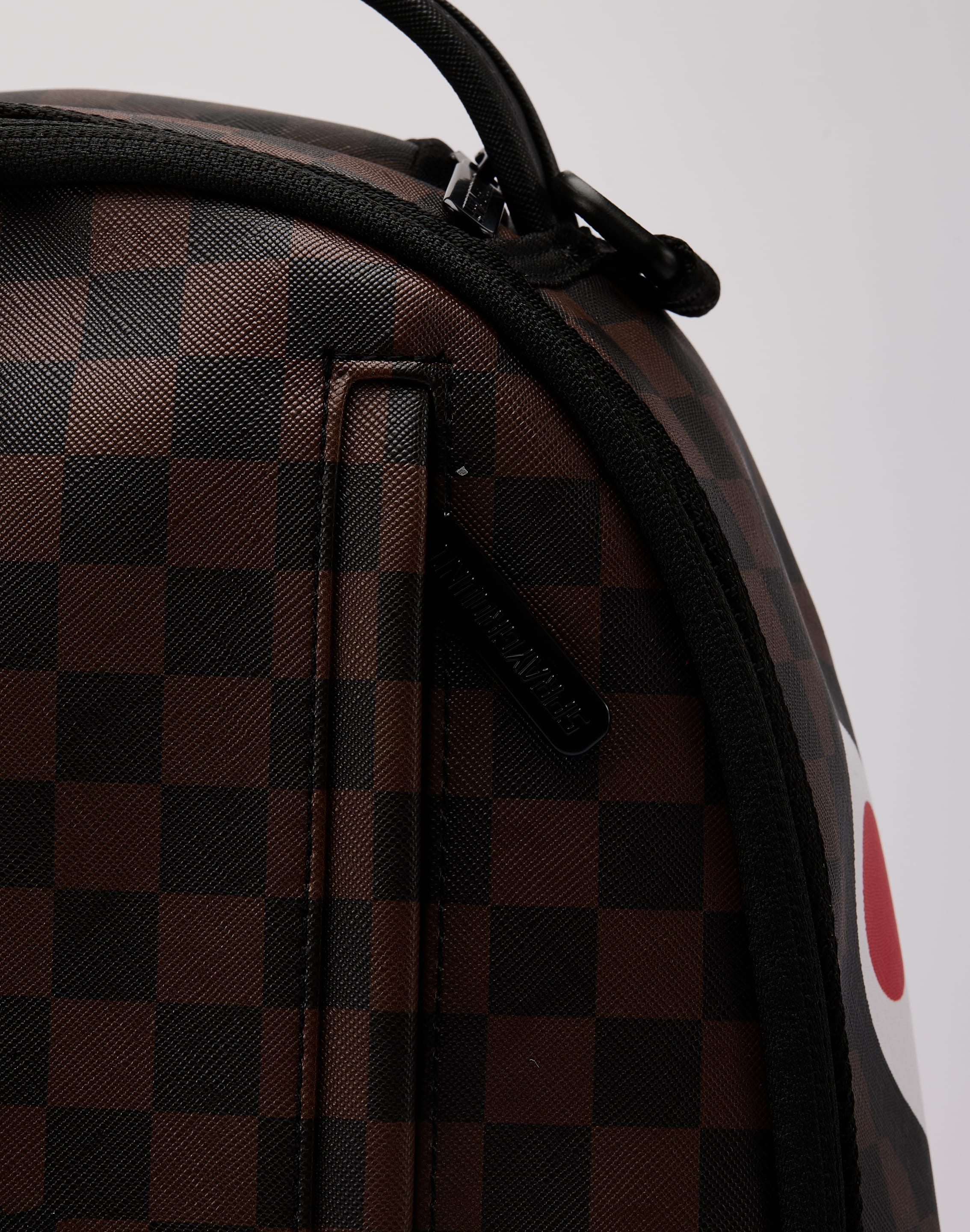 Photo of Sprayground Claw Tear Check Backpack