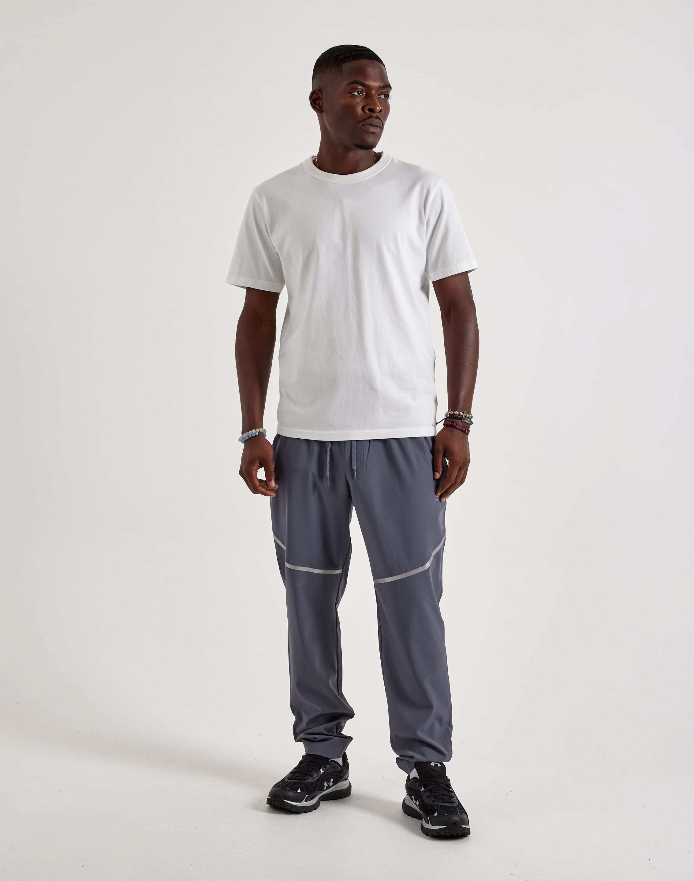Photo of Under Armour Vibe Woven Reflective Joggers