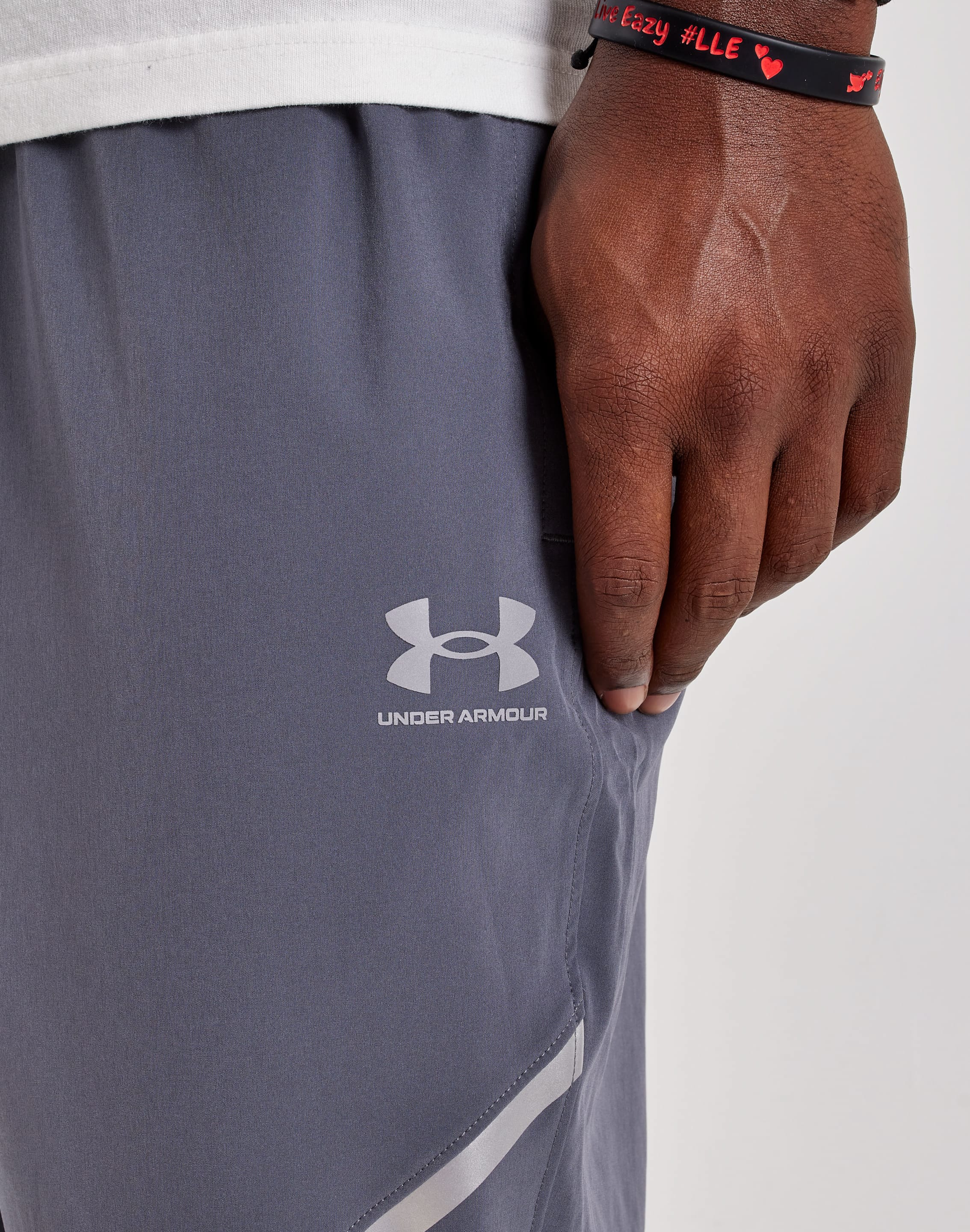 Photo of Under Armour Vibe Woven Reflective Joggers