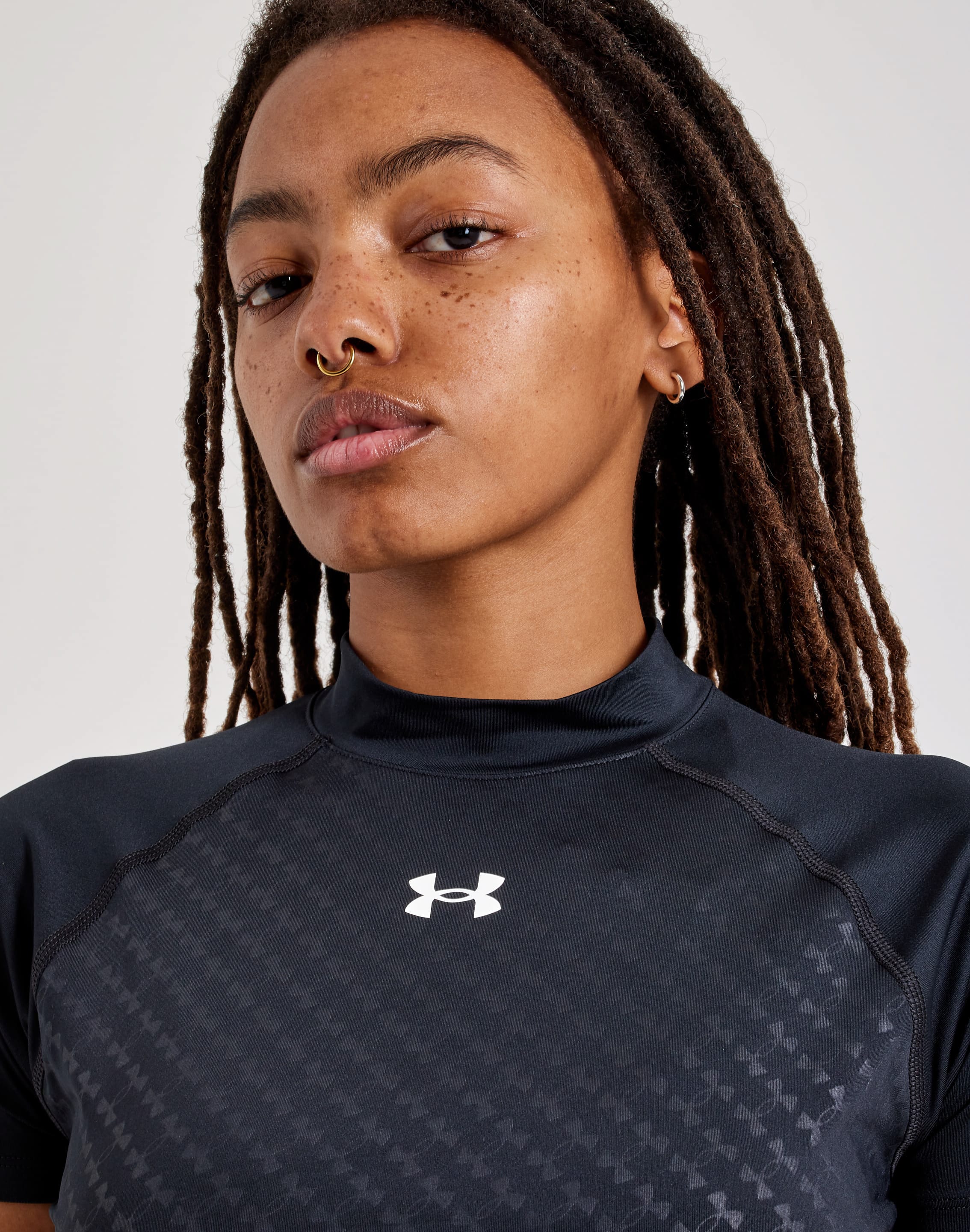 Photo of Under Armour Emboss Crop Mock Short-Sleeve Top