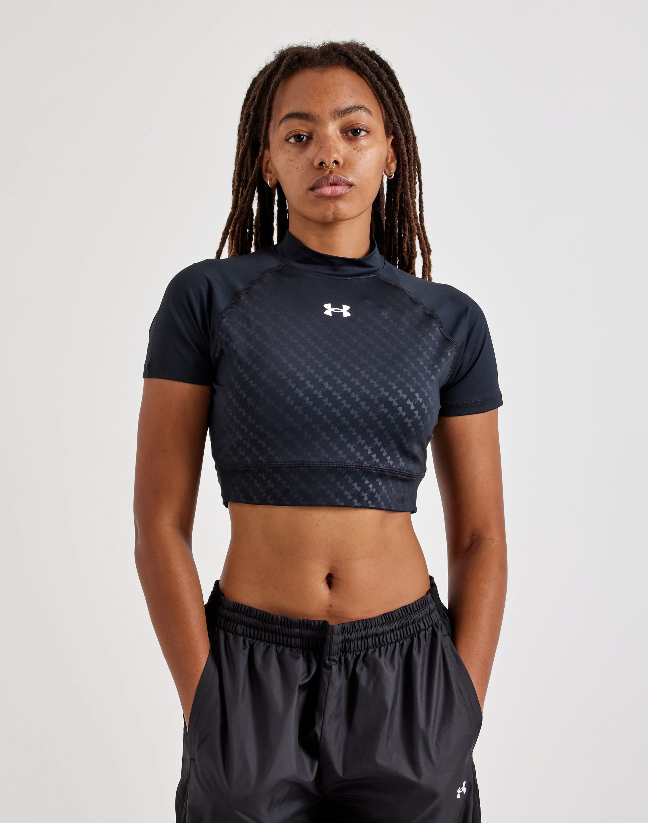 Photo of Under Armour Emboss Crop Mock Short-Sleeve Top