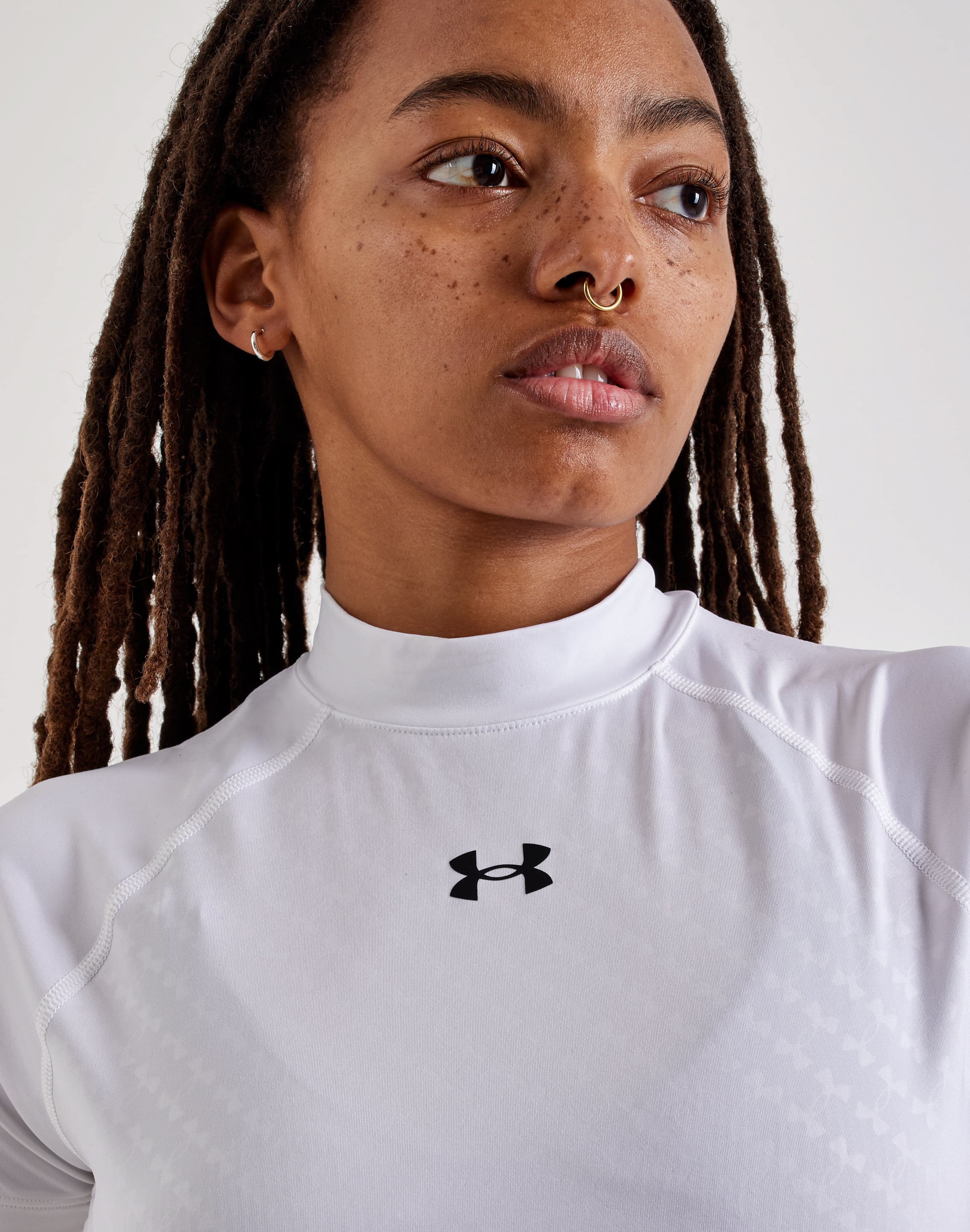 Photo of Under Armour Emboss Crop Mock Short-Sleeve Top